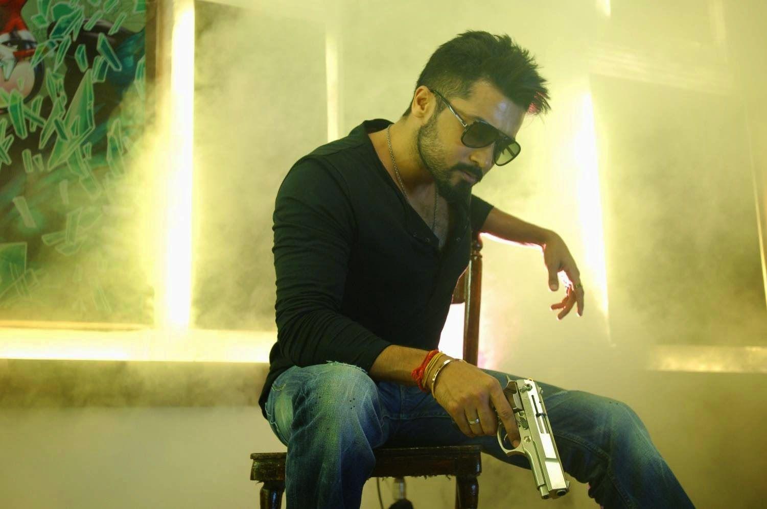 Suriya Holding Gun Photo from Anjaan Movie