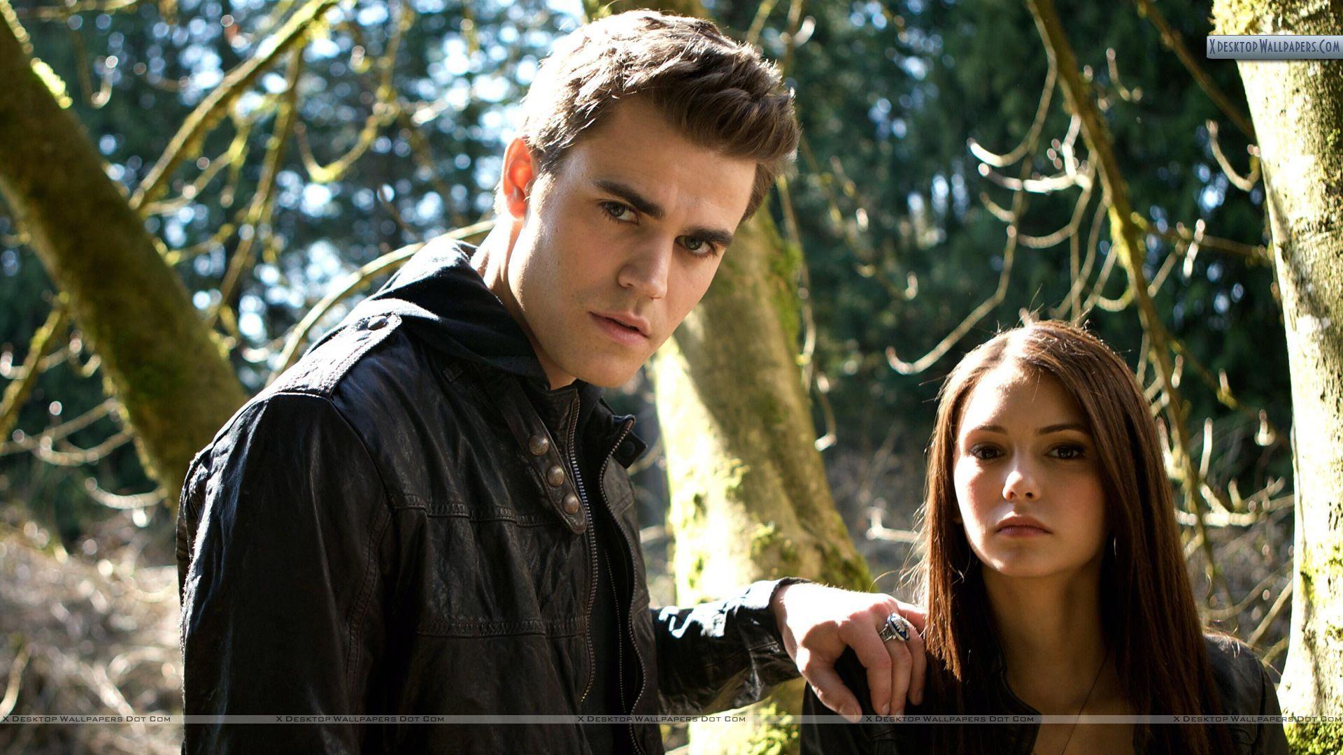 Stefan In Jungle With Elena in Vampire Diaries Wallpaper