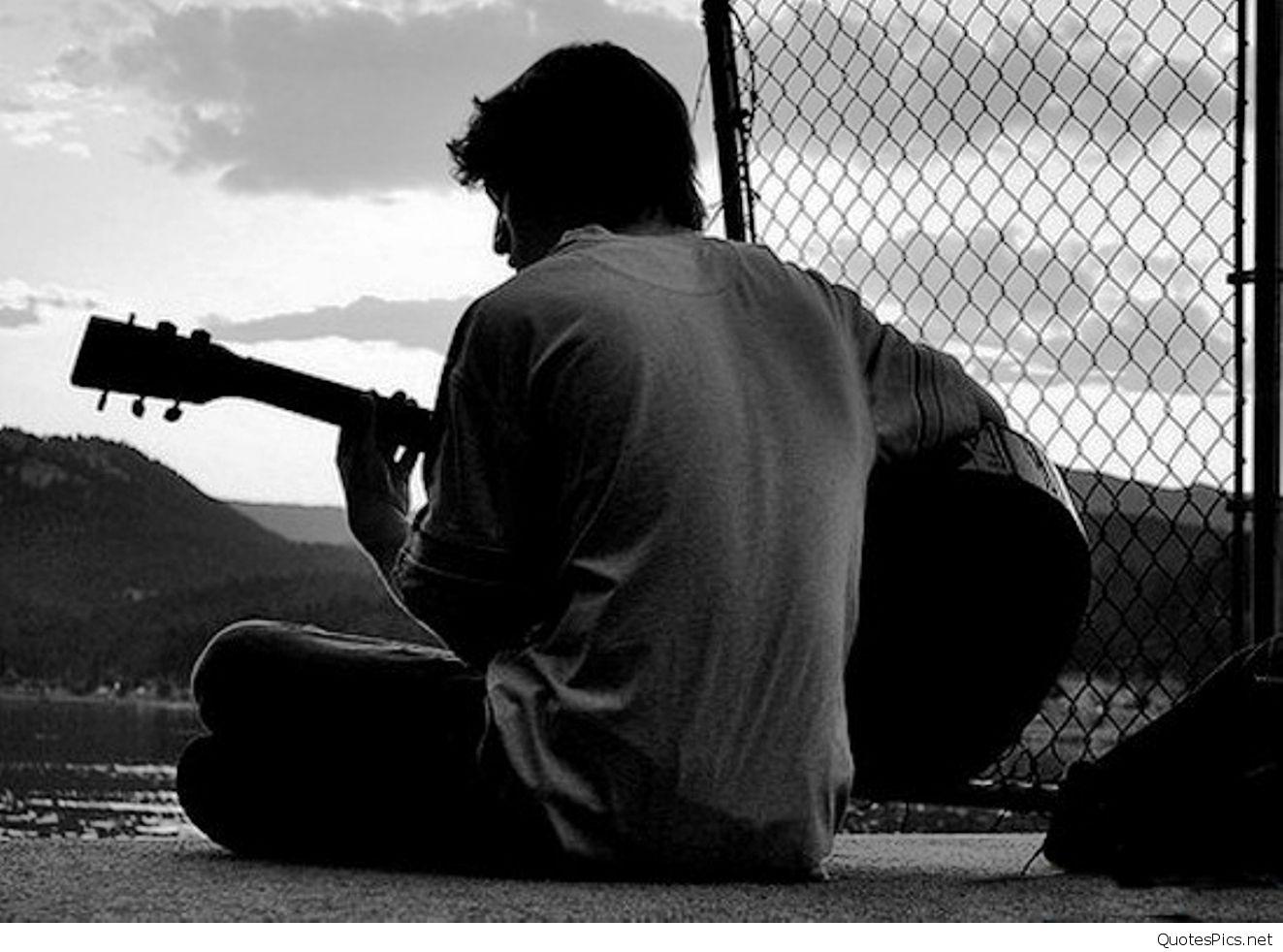 sad boy and girl with guitar