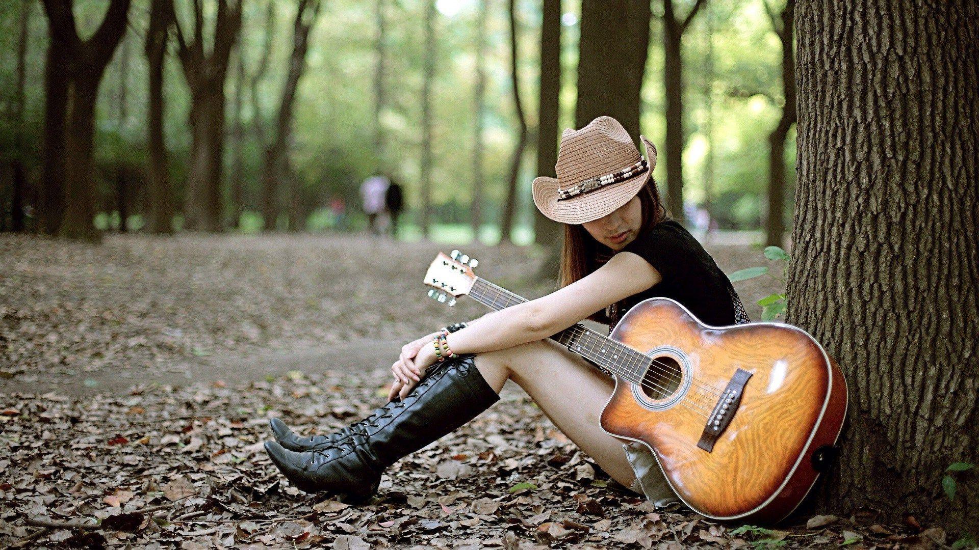 sad boy and girl with guitar