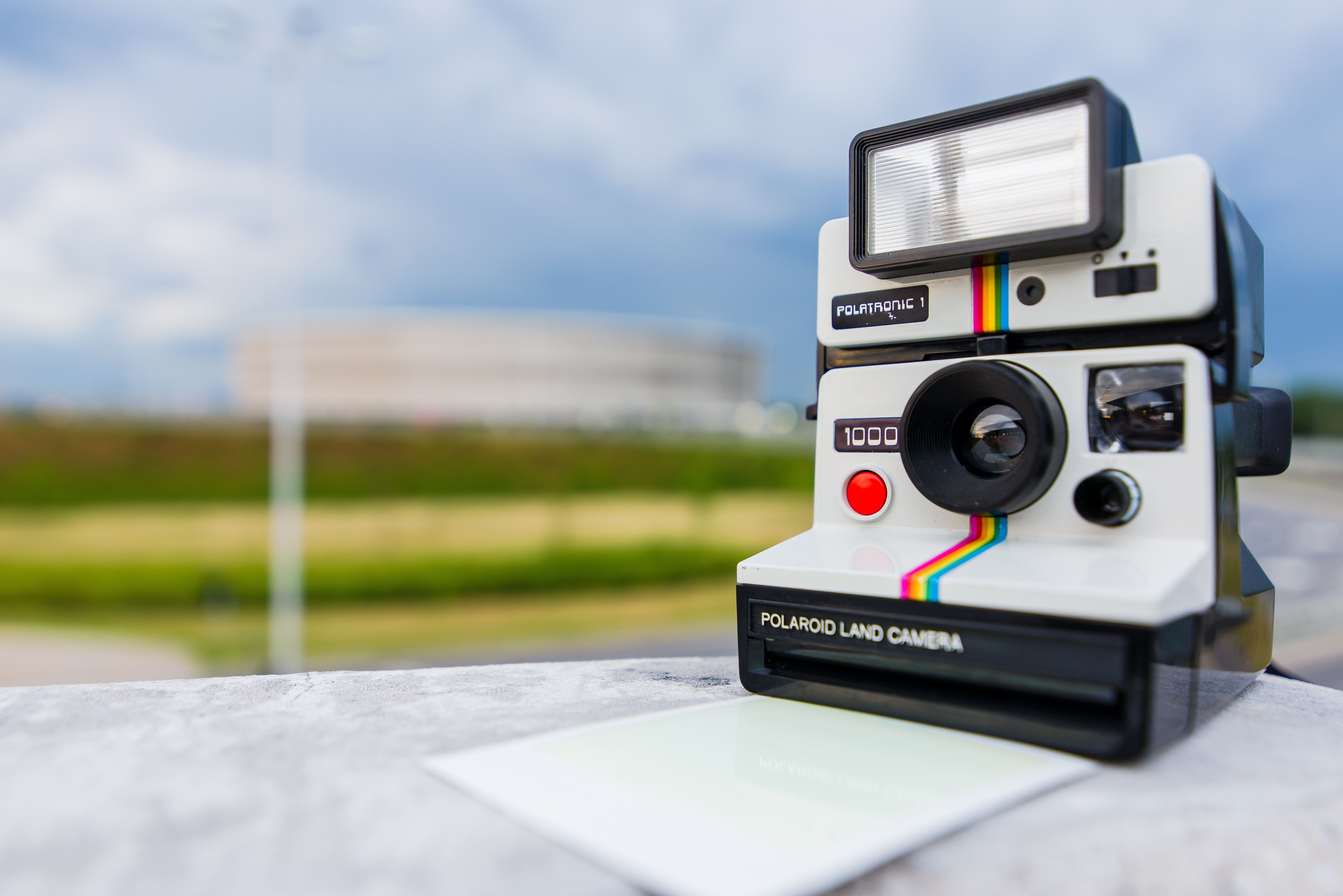 Tilt Shift Photography of Polaroid Land Camera on White Table · Free