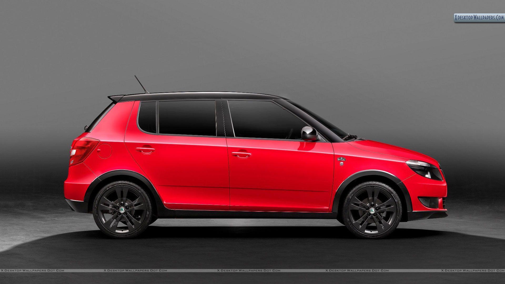 Red Color 2011 Skoda Fabia Monte Carlo Side Pose Wallpaper