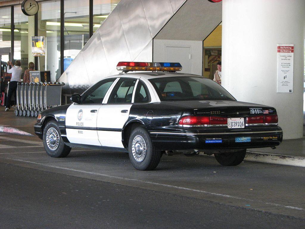 LAPD Ford Crown Victoria outside LAX. Los Angeles Airport. Highway