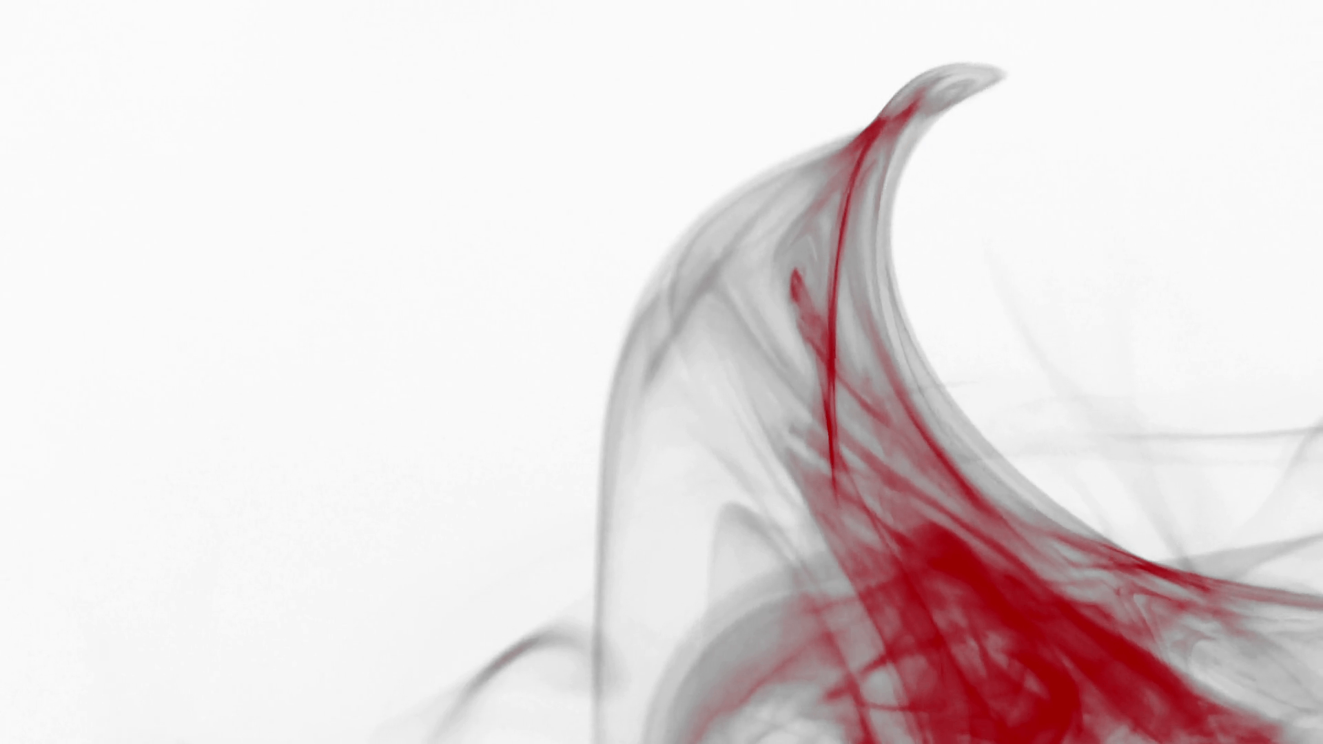 Curly wave of black and red smoke on white background
