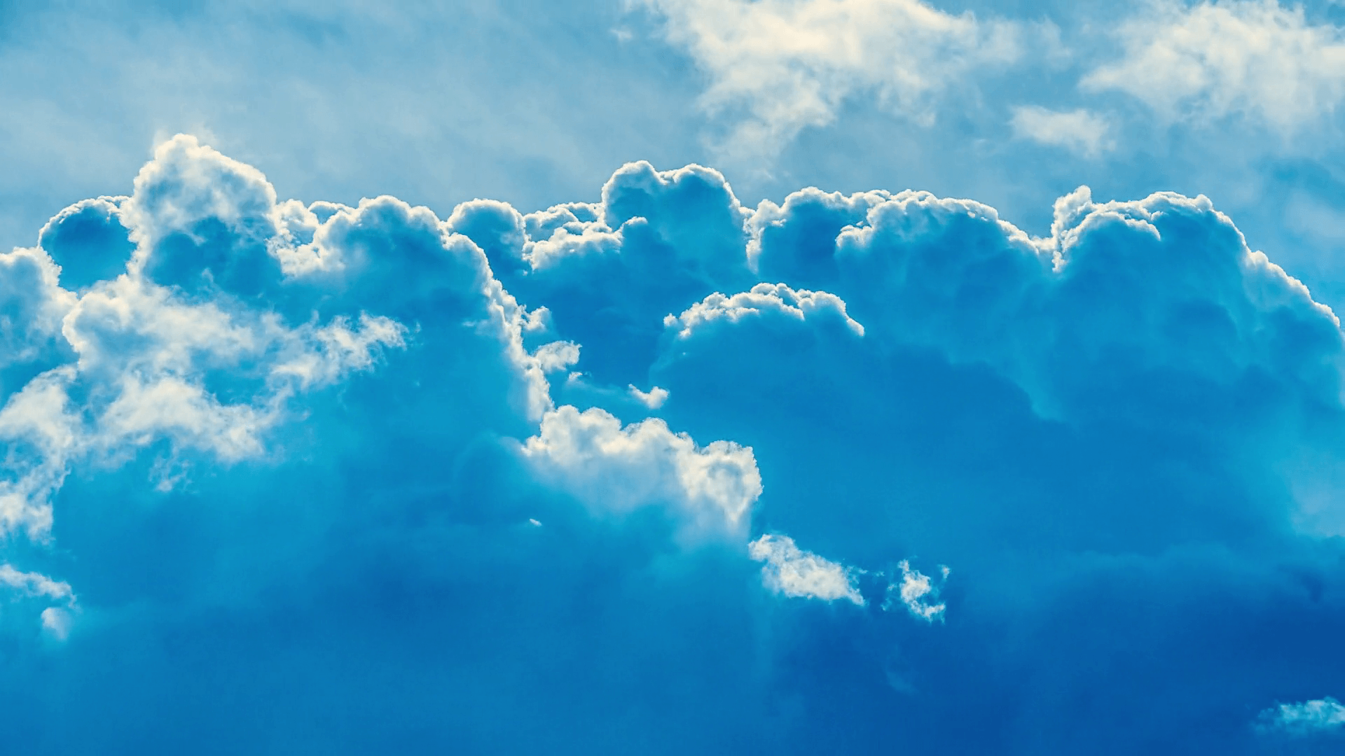 Epic storm clouds over blue sky background. 4K UHD Timelapse. Stock