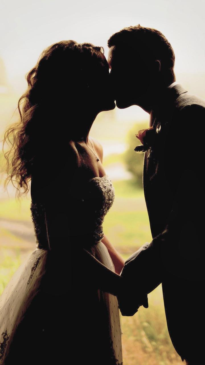 Couple Silhouette Kissing