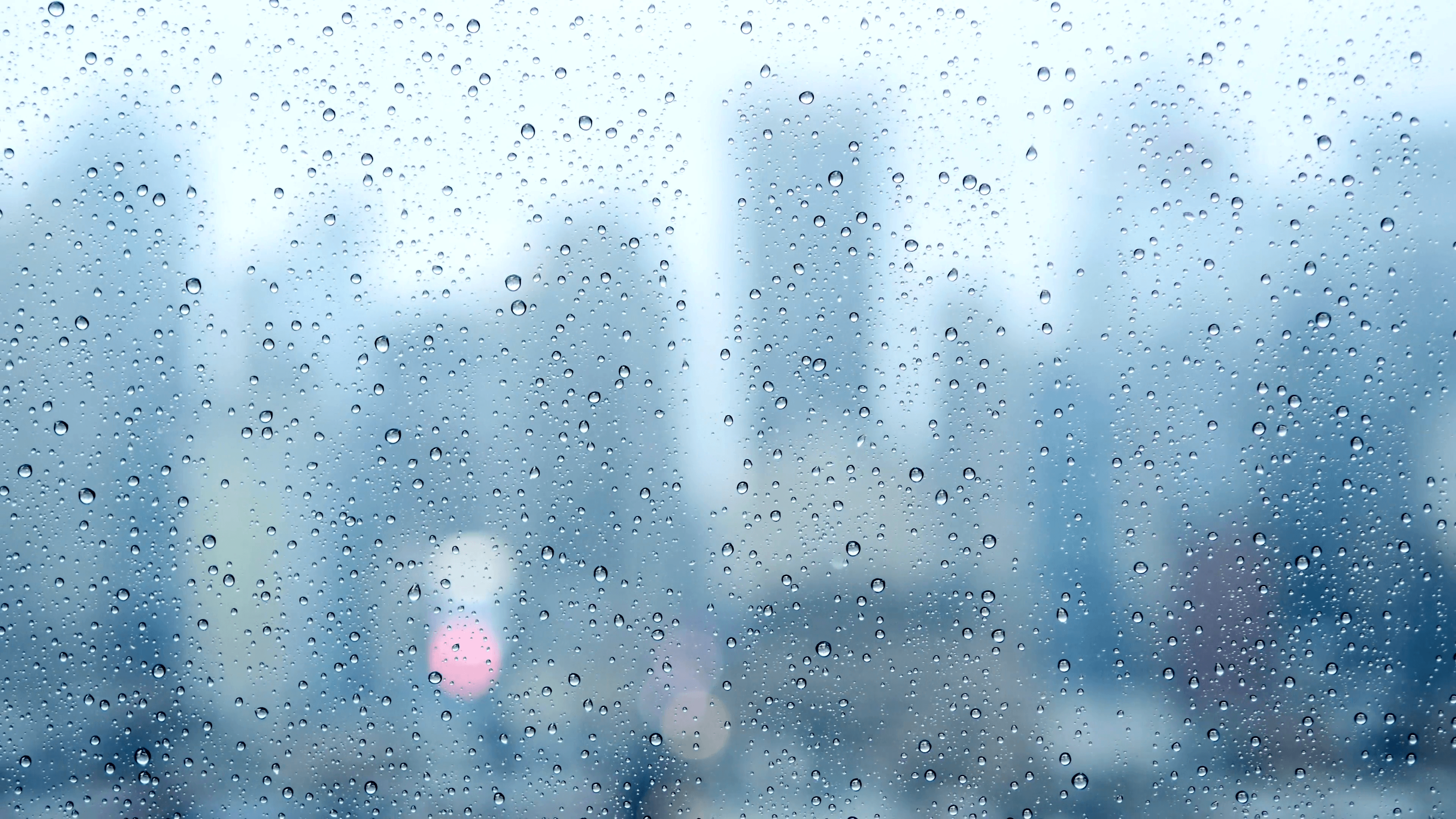 crying sadness sad. blurred background. water drops on window. rain