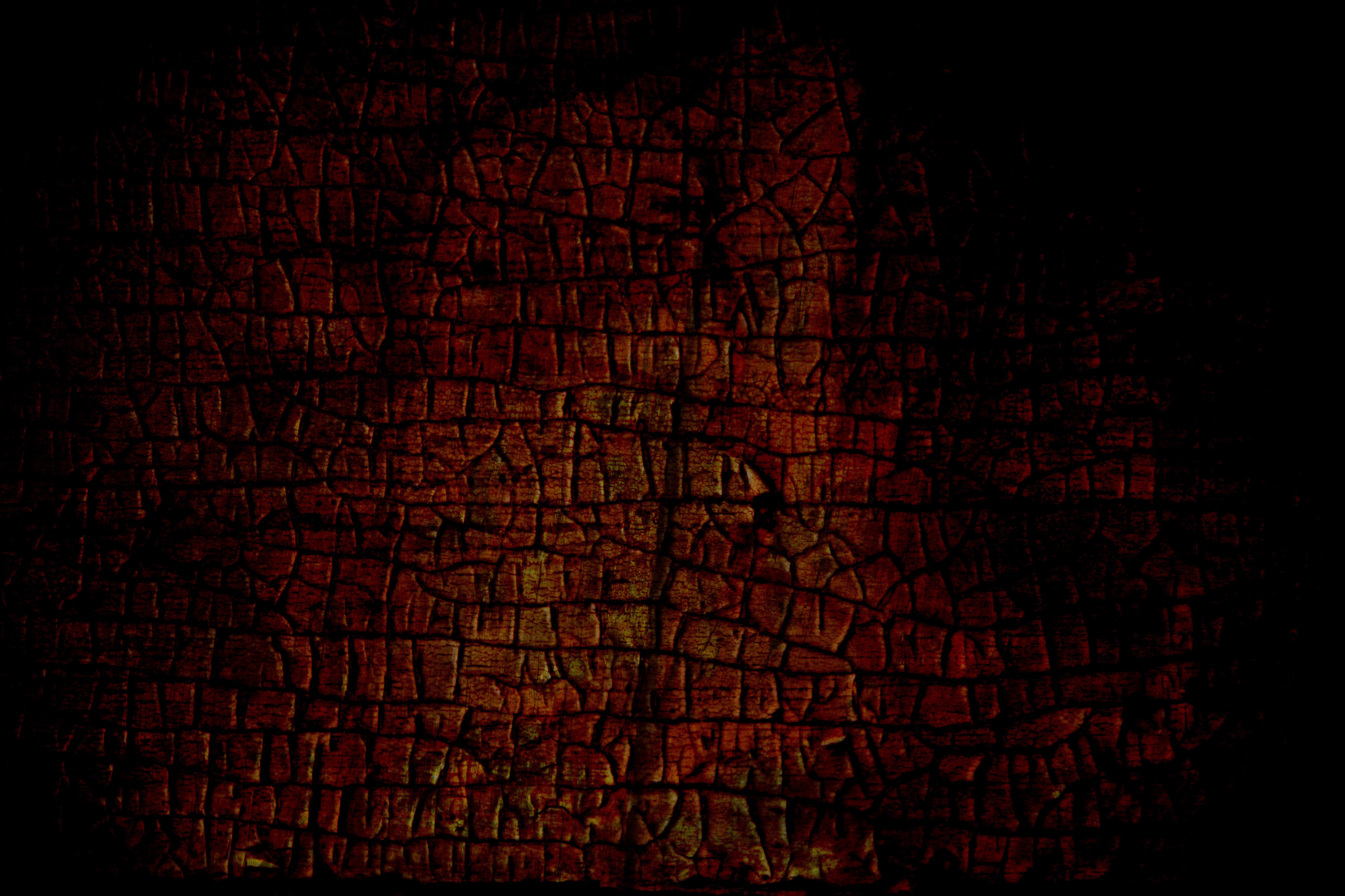 dark grunge texture cracked dark red rough dry surface wallpaper