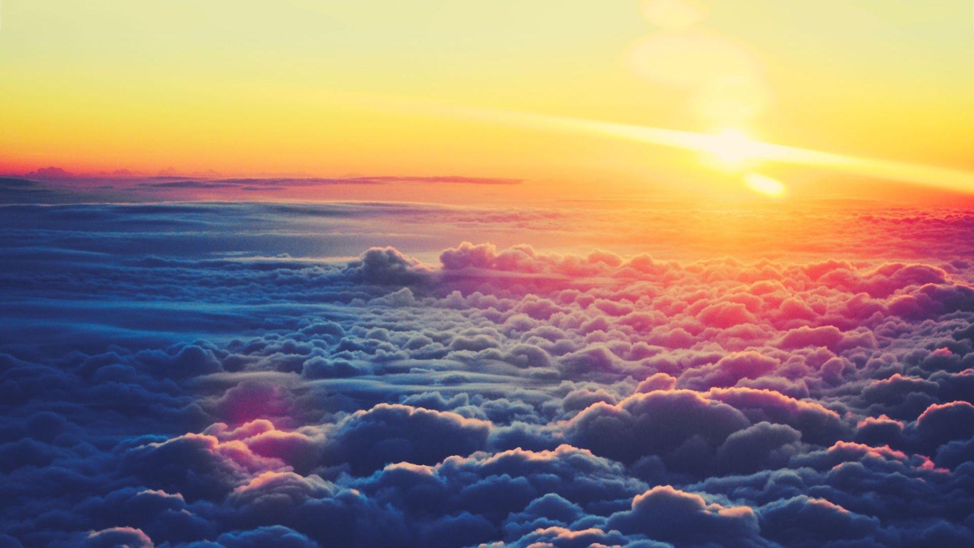 Sunset Over Clouds Wallpaper 1920x1080