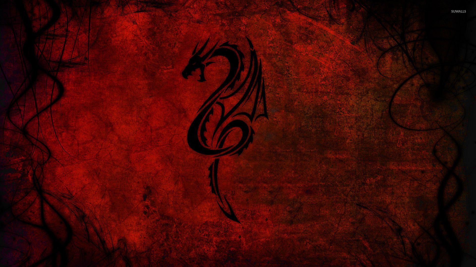 Tribal dragon tattoo on a red wall wallpaper Art