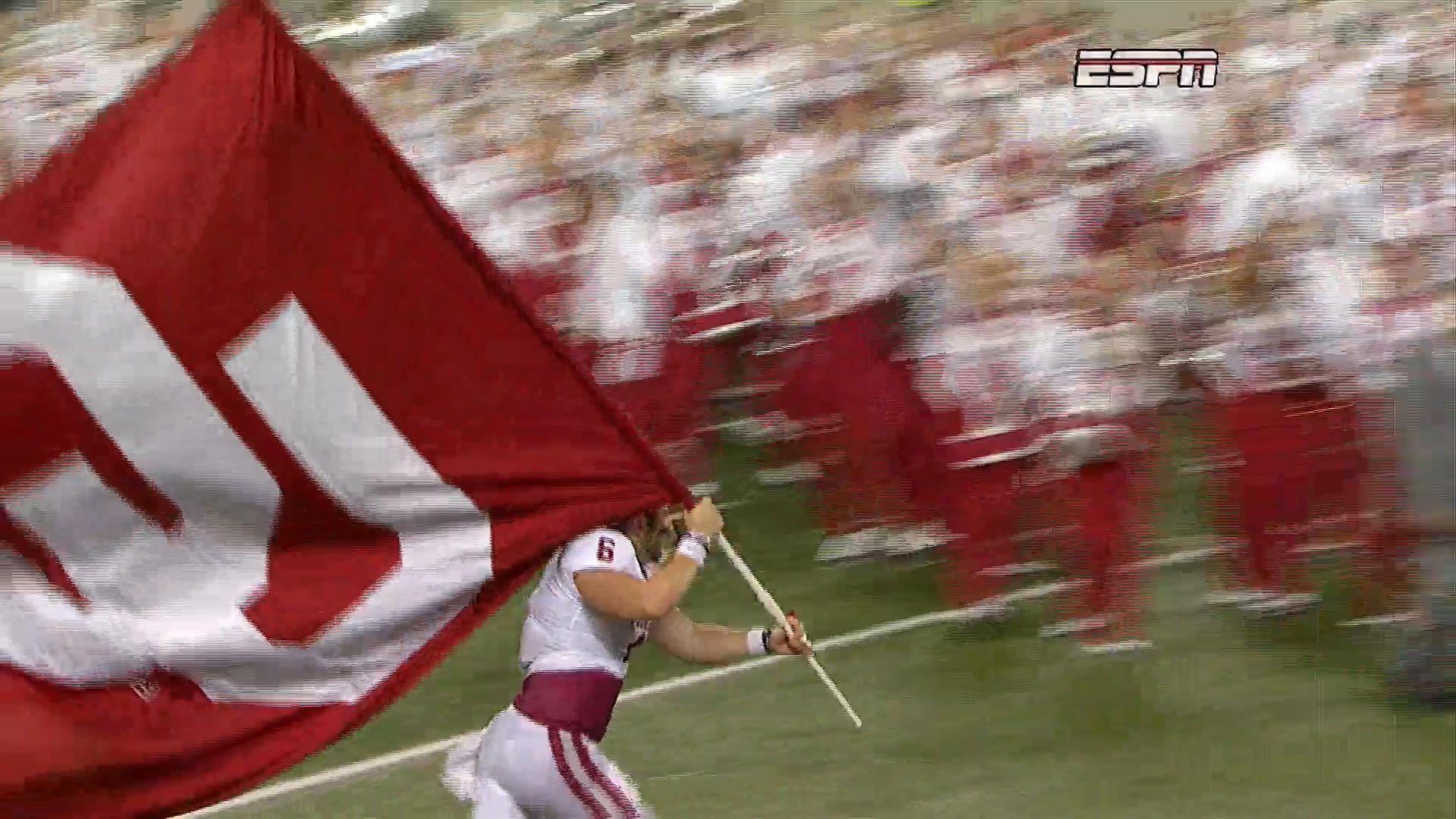 WATCH: Baker Mayfield plants OU flag in the middle of the Buckeye