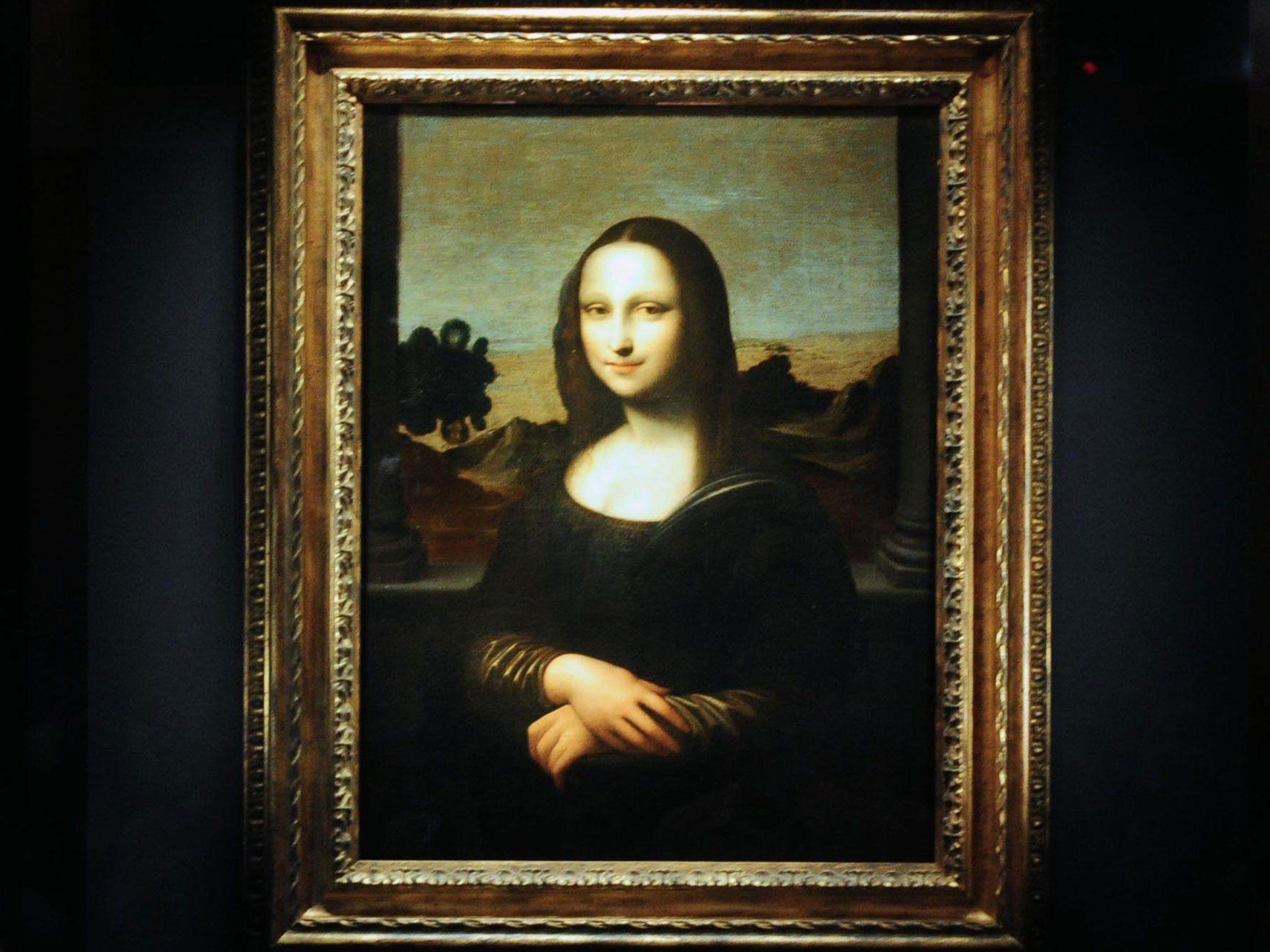 Earlier Mona Lisa' goes on tour in Asia as owners try to prove it is