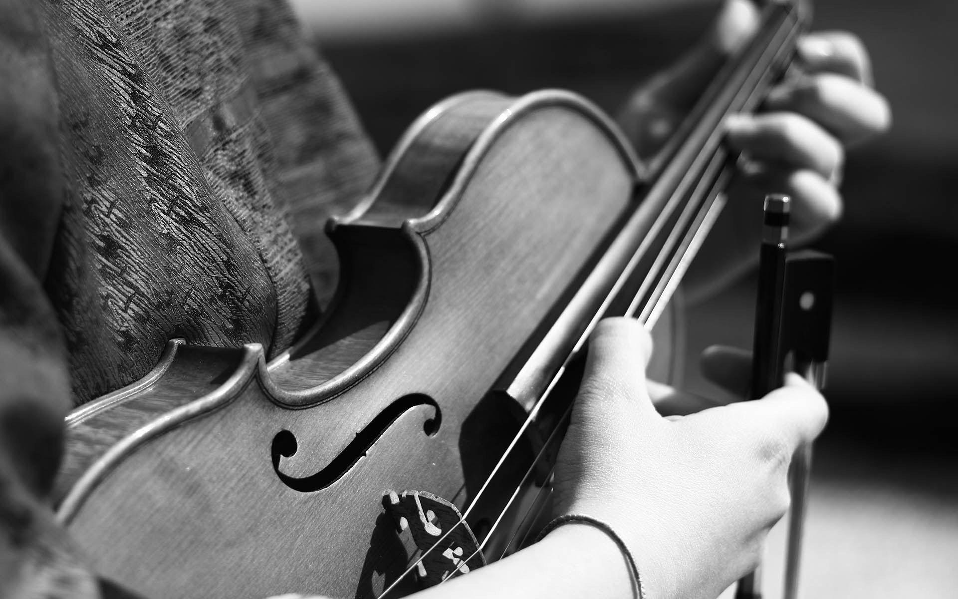 Grayscale Photography of Person Playing Violin · Free