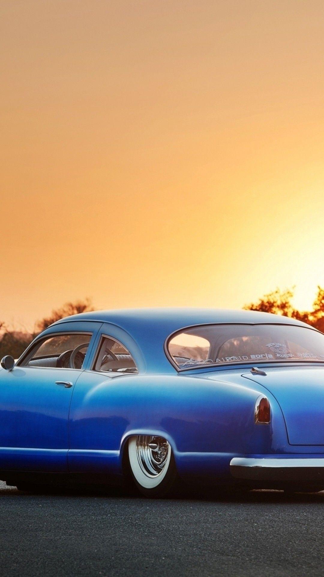 Download 1080x1920 Kaiser Lowrider, Blue, Sunset, Back View, Cars