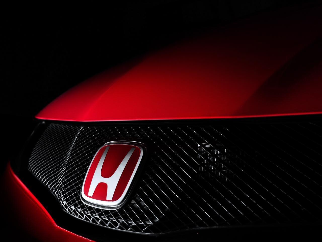 red honda logo black background