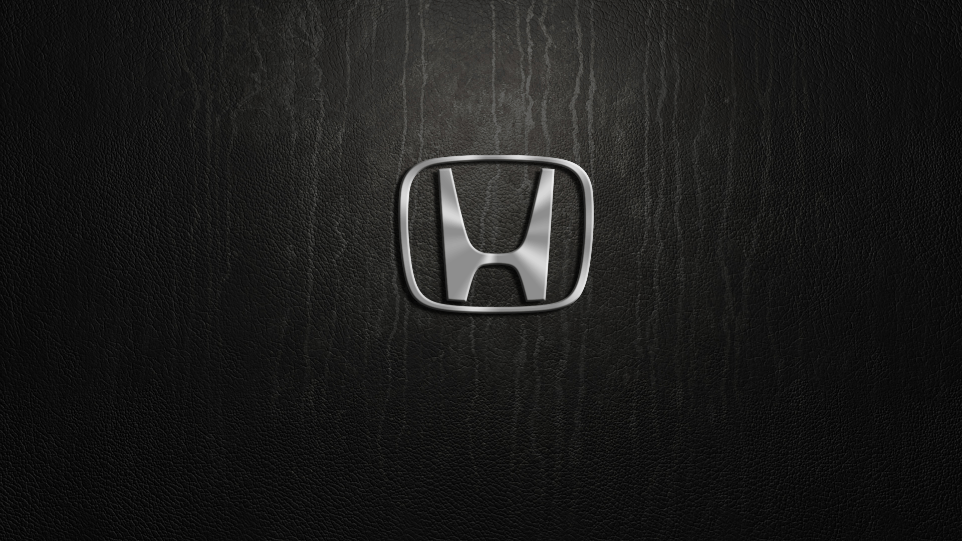 red honda logo black background