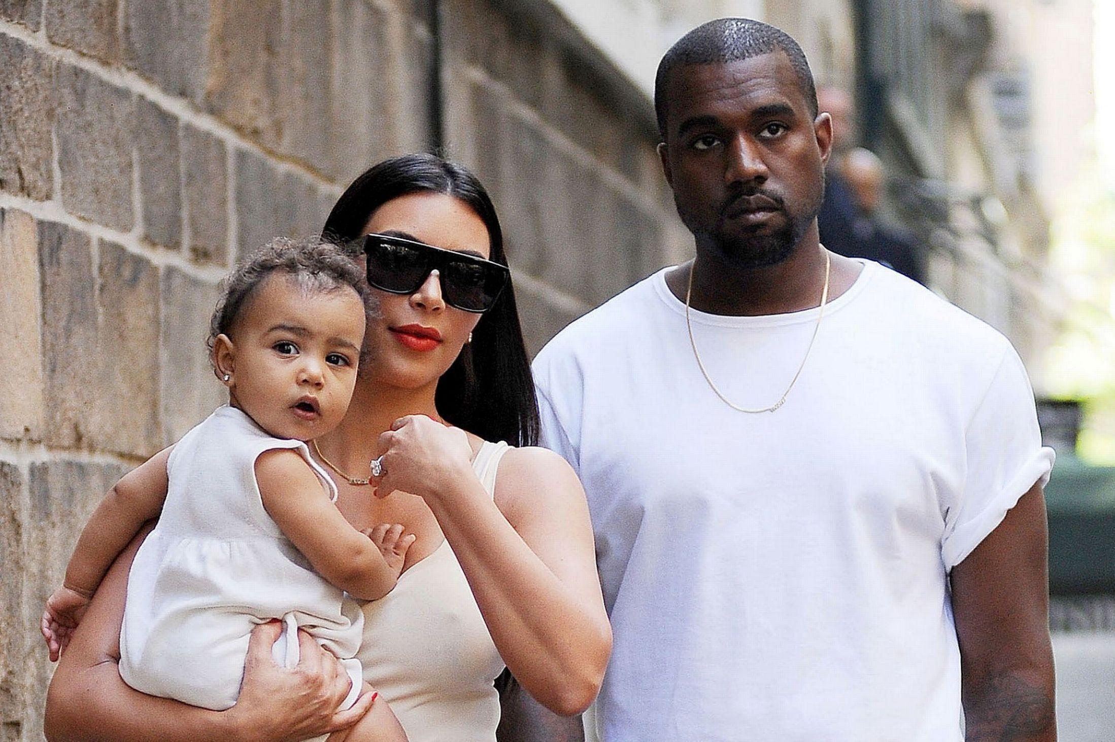 Celebrity Couple Kim Kardashian and Kanye West With His Cute Baby