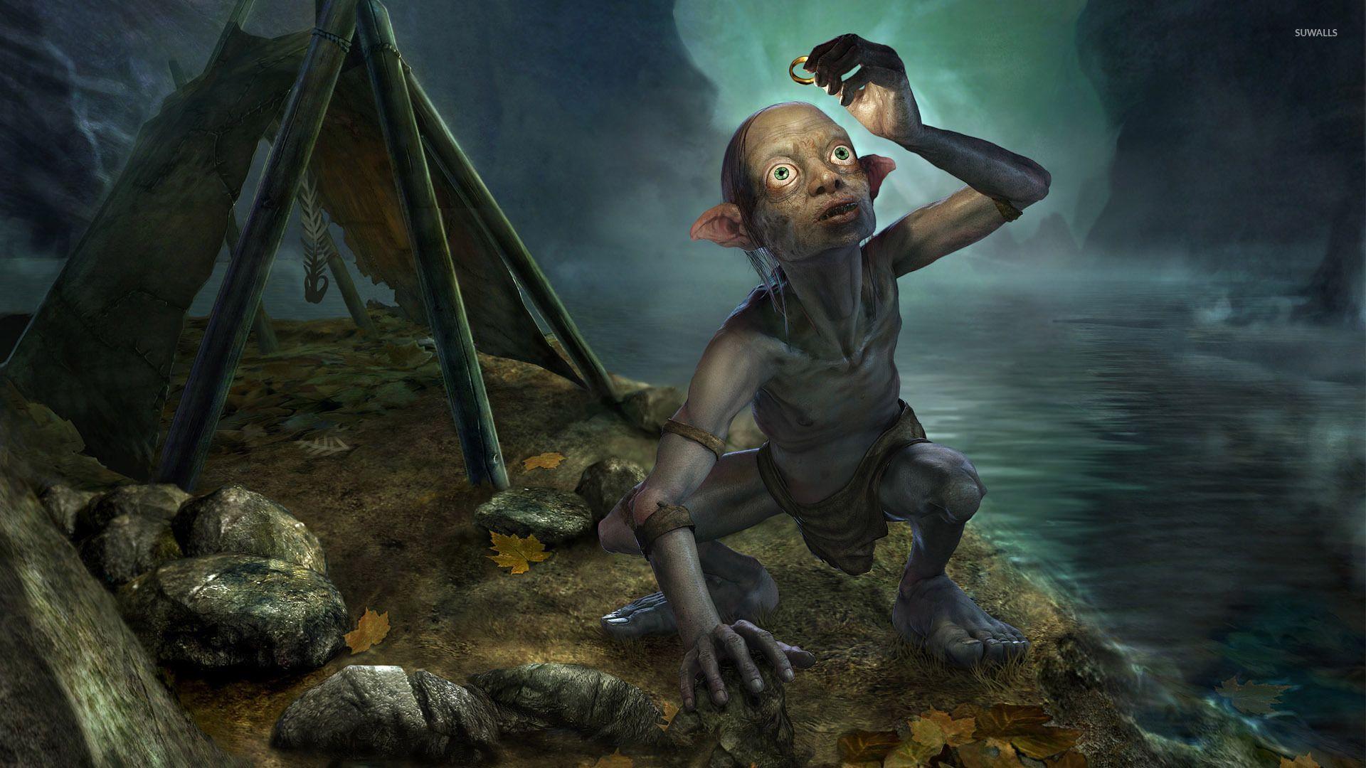 Gollum holding One Ring Lord of the Rings wallpaper