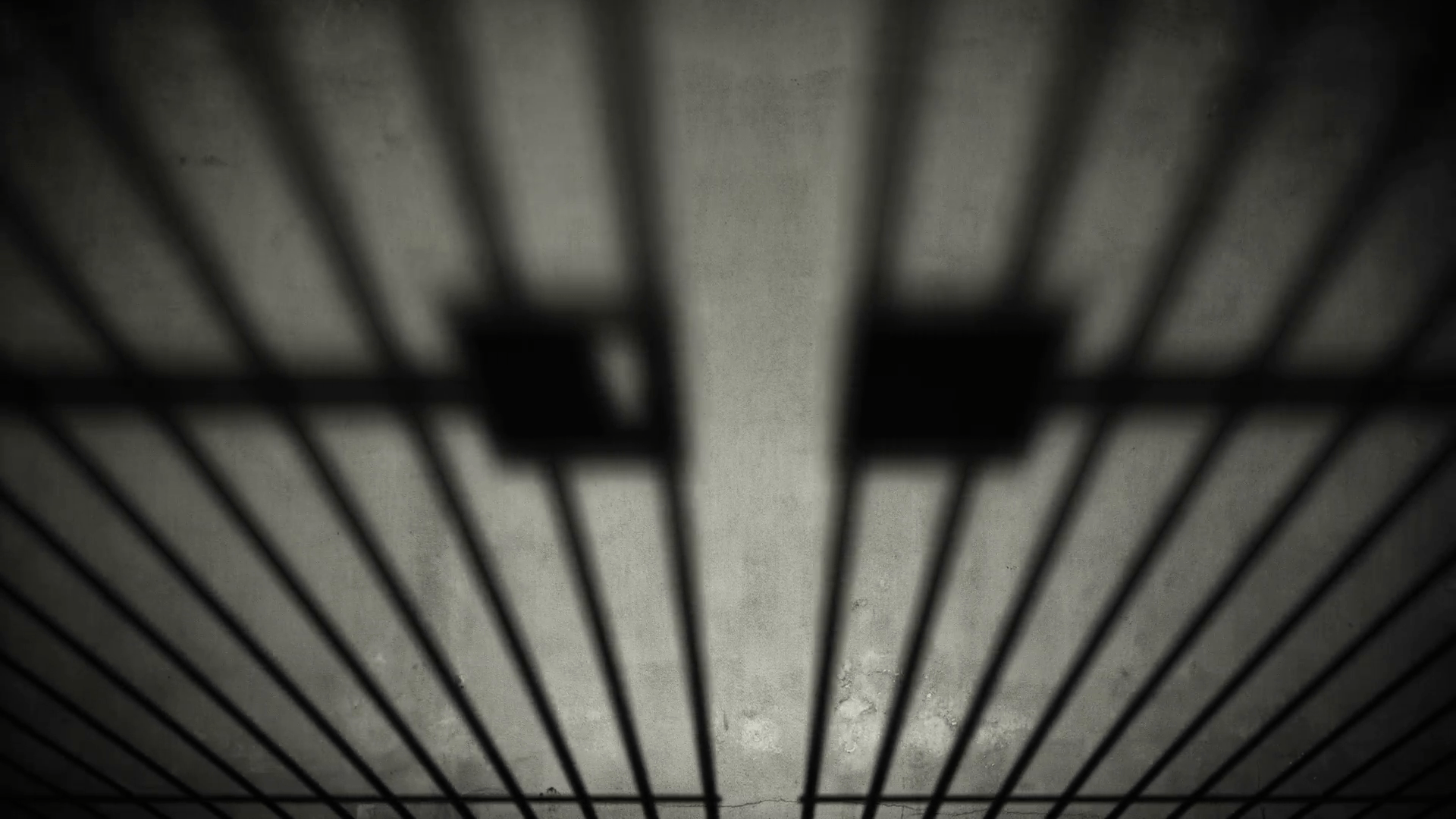 Life imprisonment, prison cell door closing shadow on dark concrete