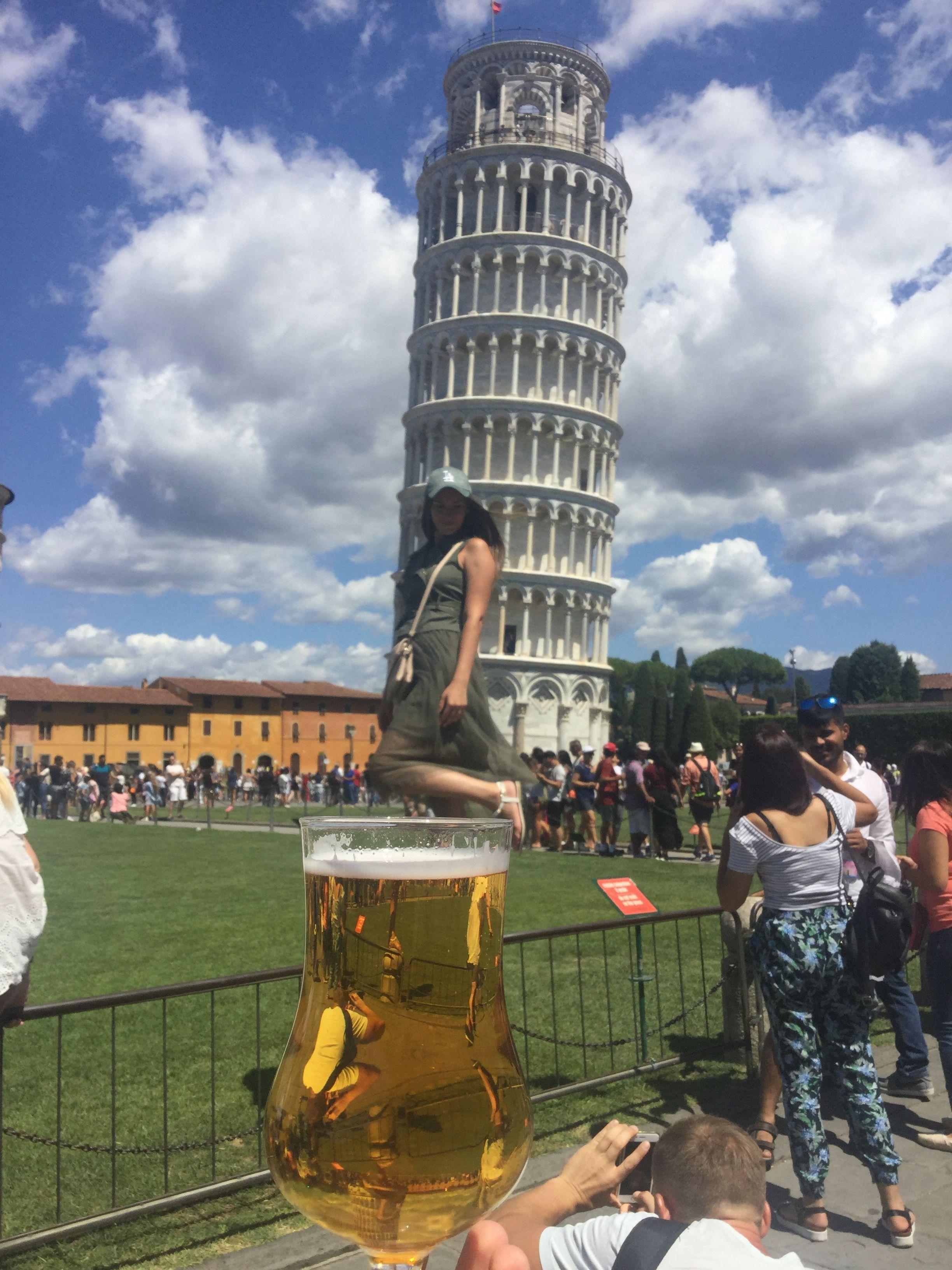 Visiting the famous Leaning Tower of Pisa at the Square of Miracles