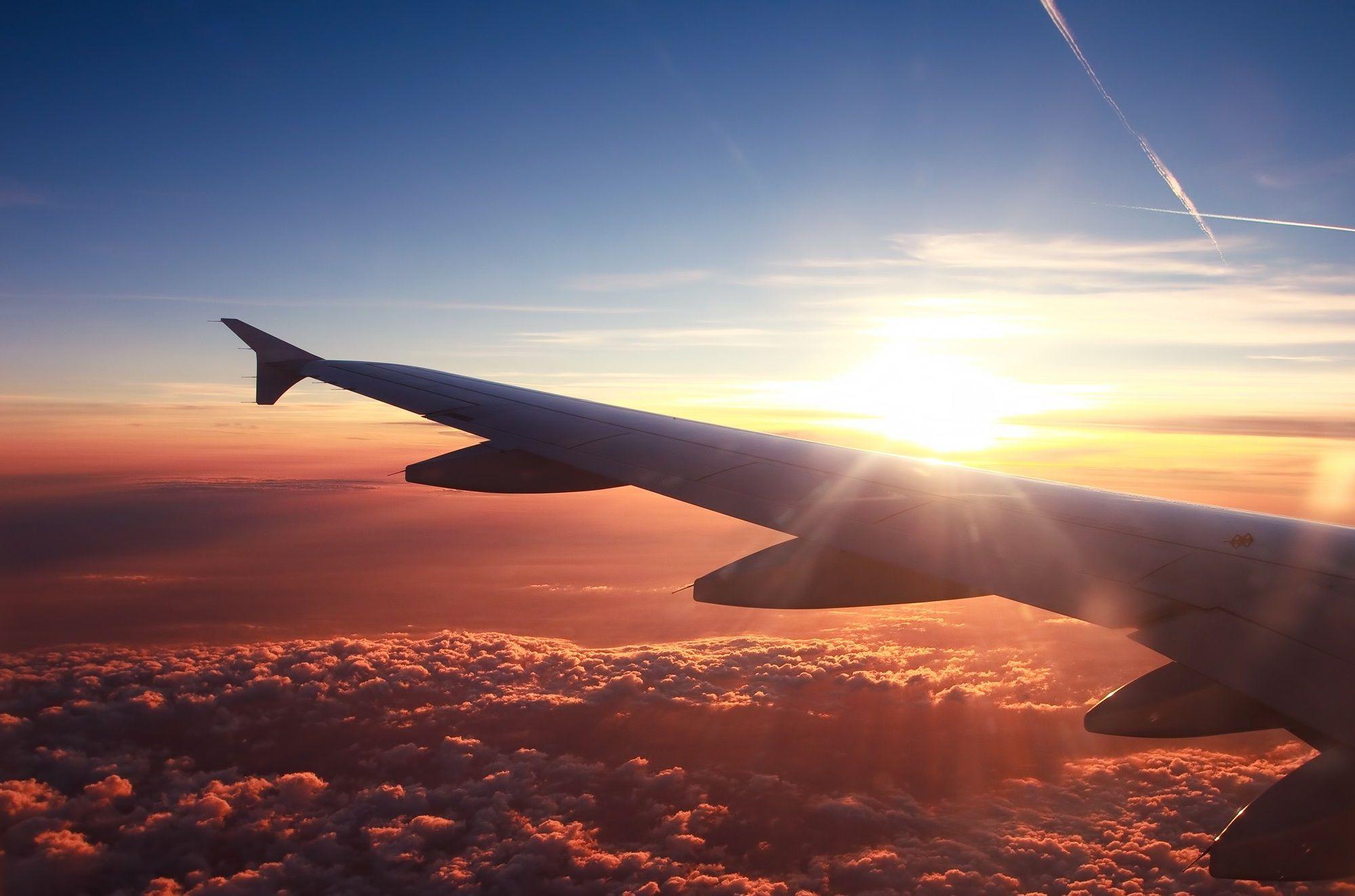 Airplane Wing Over The Clouds Wallpaperx1322