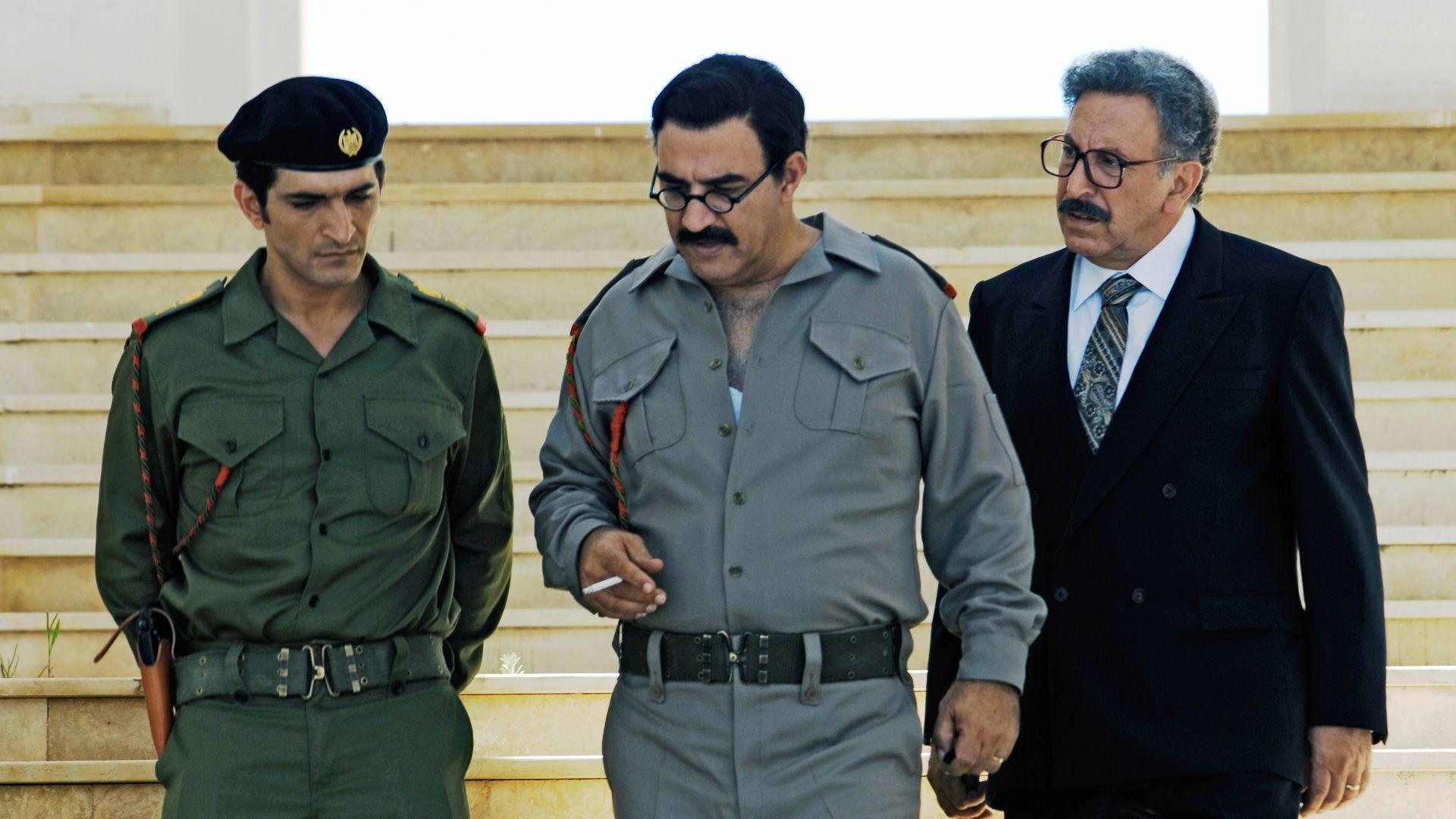 From left to right: Hussein Kamel, Saddam Hussein, and Tariq Aziz