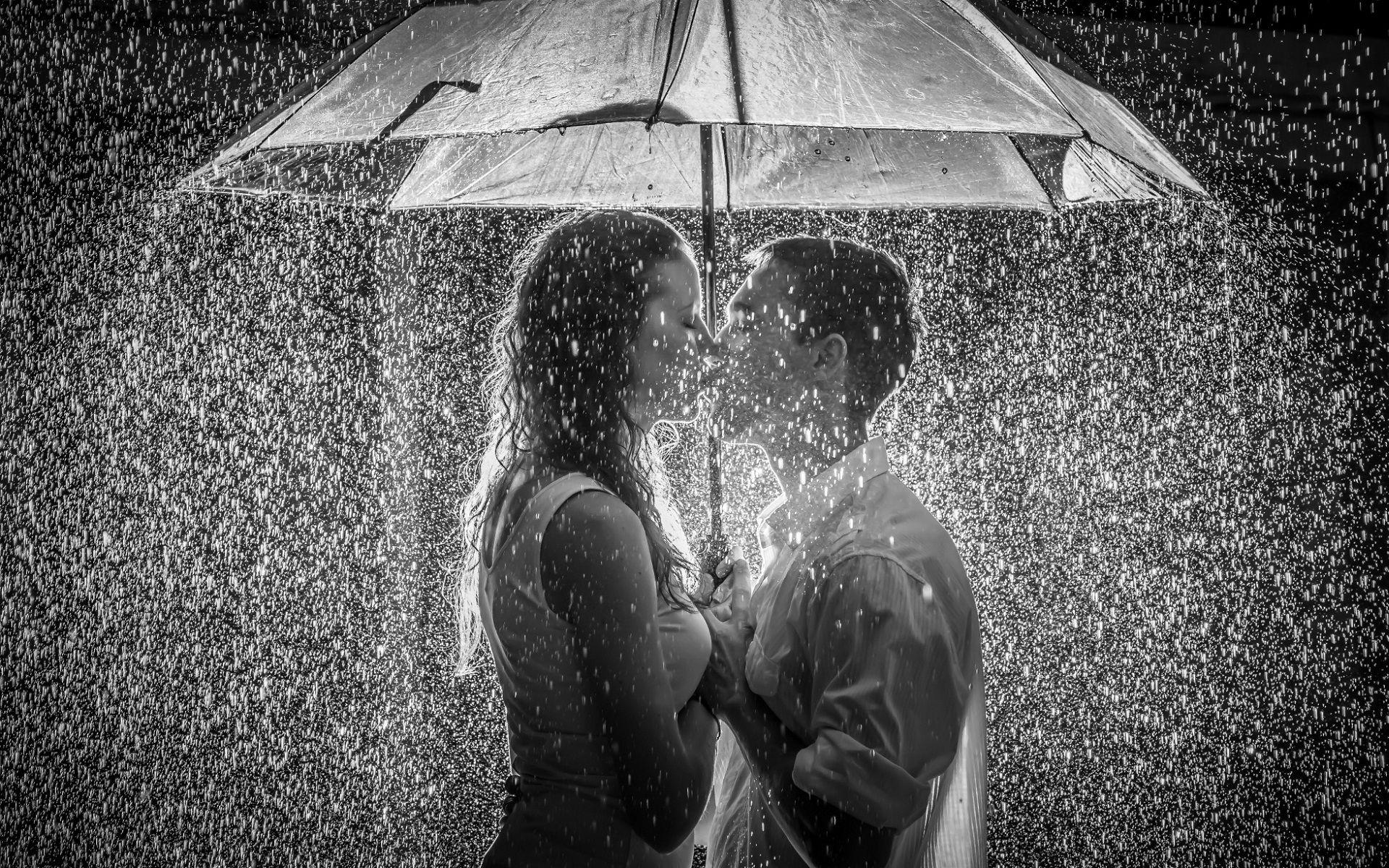 Love romance and kiss of couple in rain image.