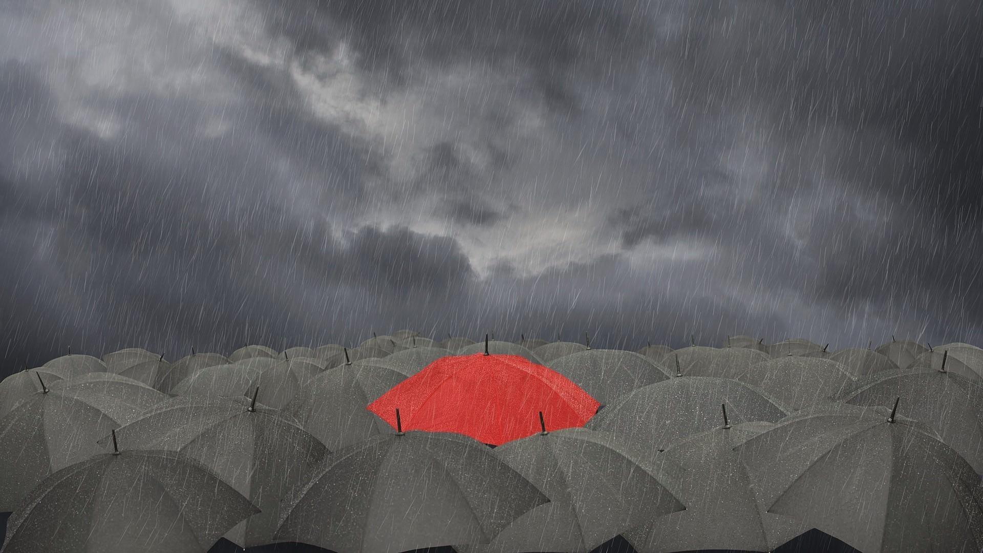 Red Umbrella In The Middle Of The Central Blac Wallpaper