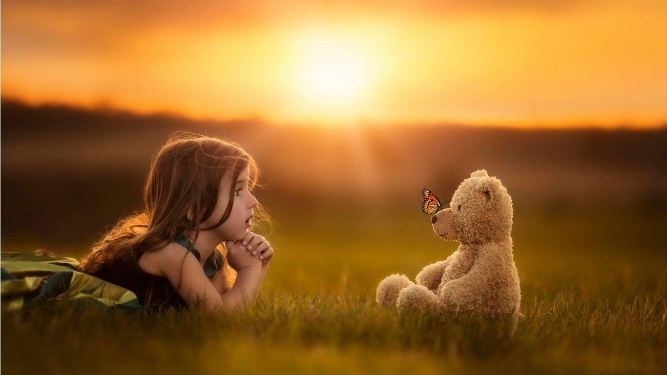 Cute Little Girl With Teddy Butterfly Wallpaper