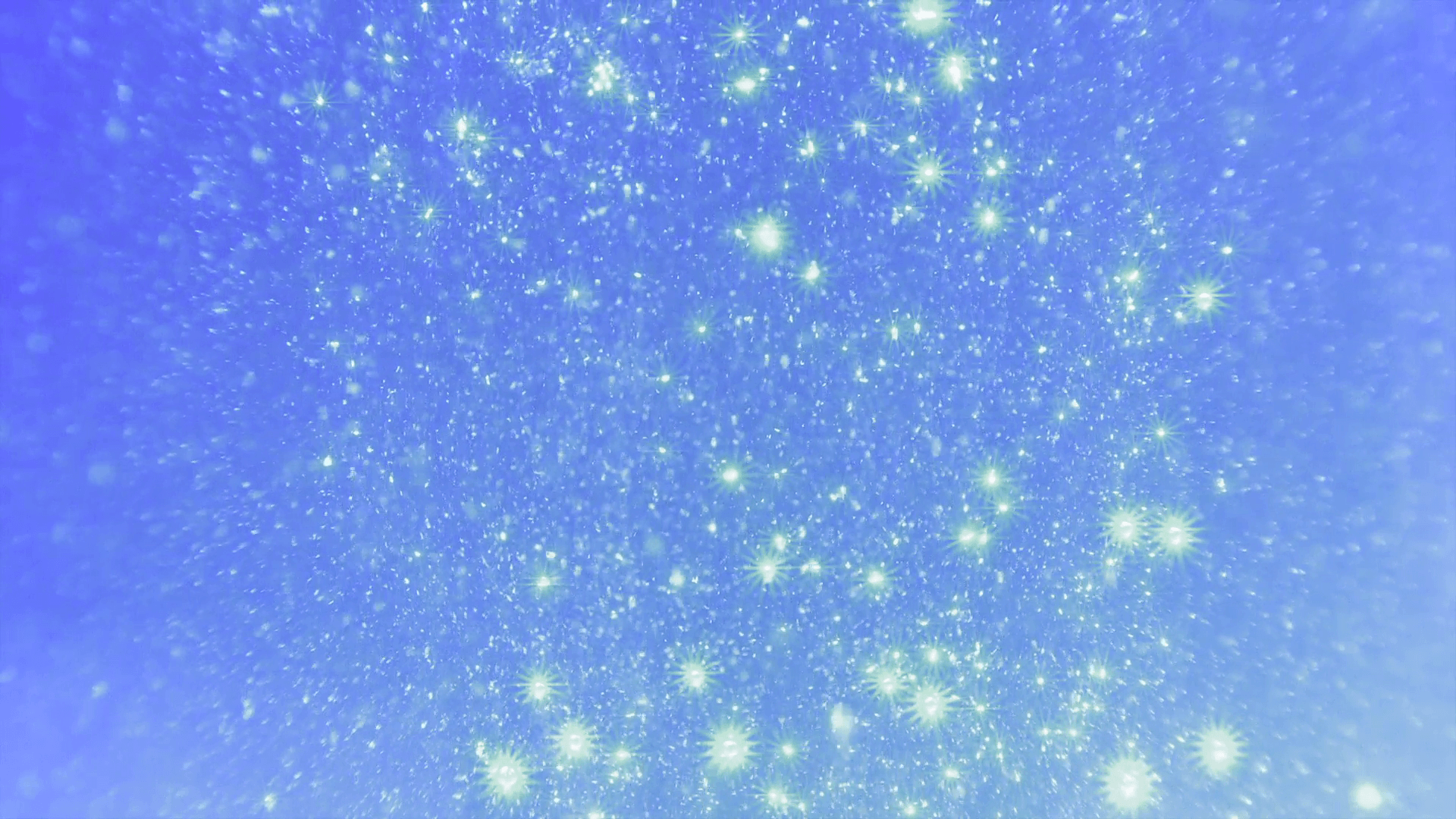 Magical sparks, bubbles, particles, light, stars floating on a blue