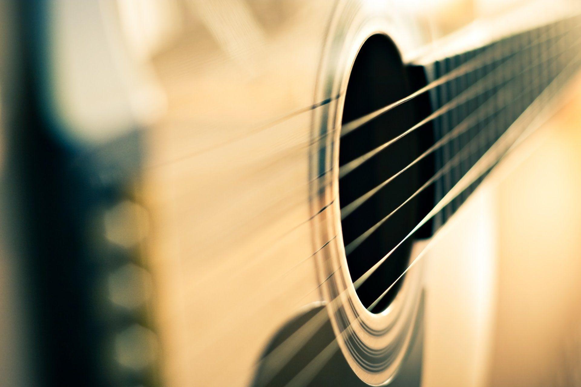 close up musical instruments guitars string blur background