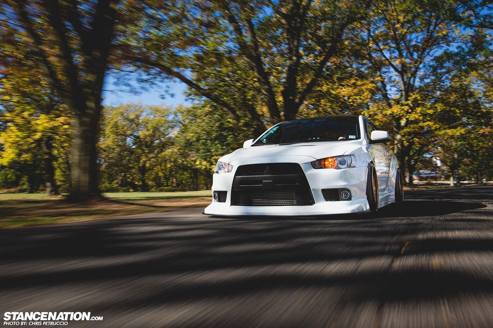 White Mitsubishi Lancer Evo X on the road wallpaper and image