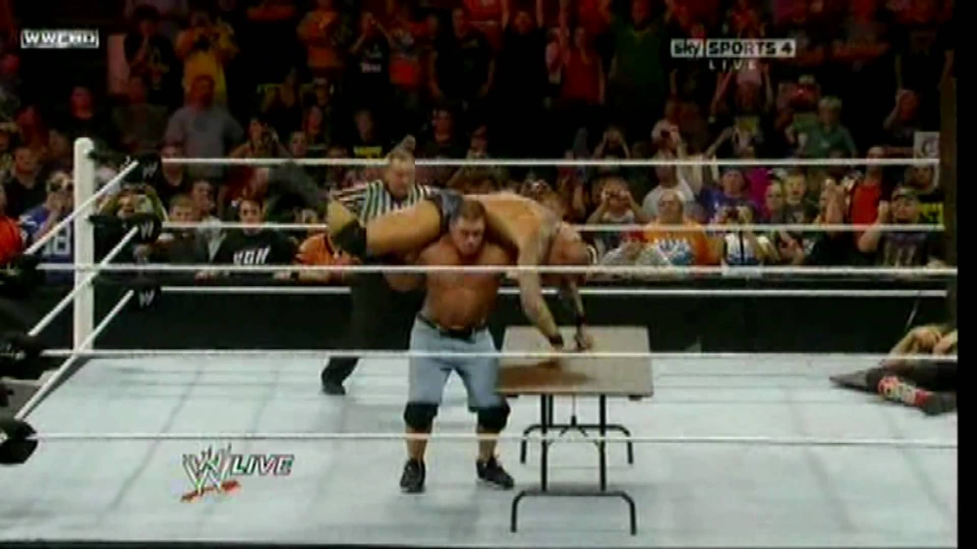 Randy Orton Attitude Adjusment Into RKO to John Cena Trough Table