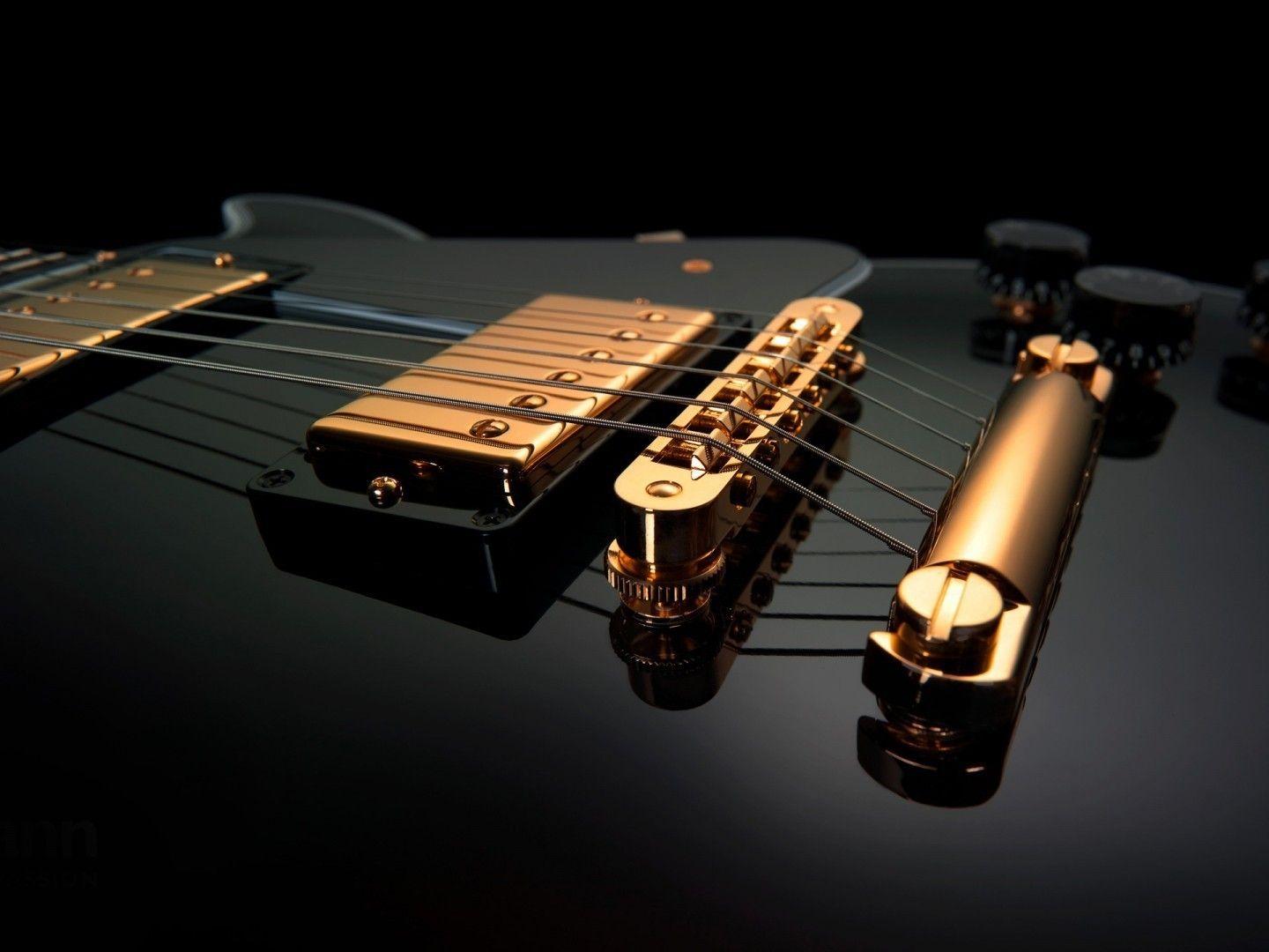 Black and gold guitars music wallpaper. PC