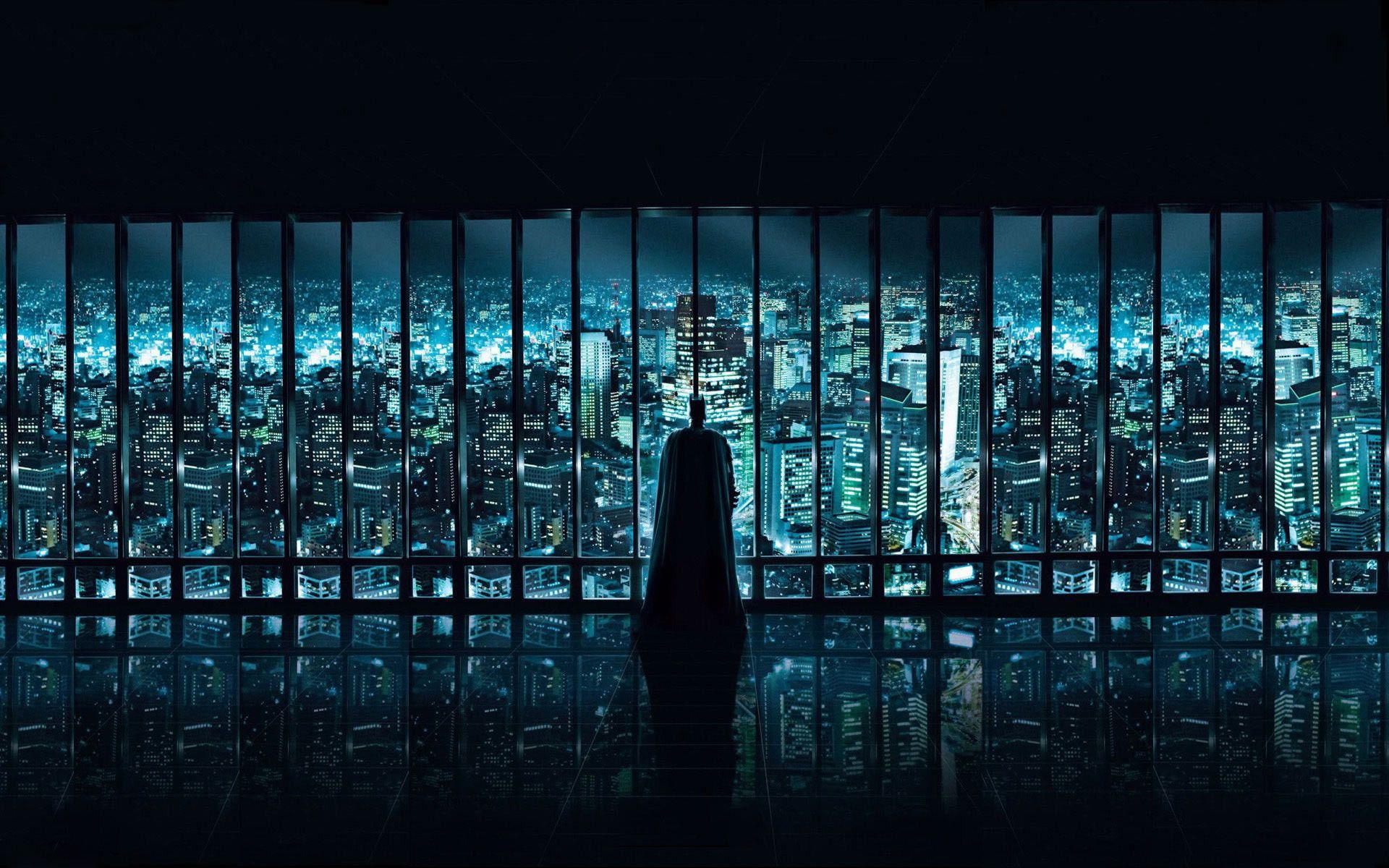 Batman watching over Gotham City free desktop background and wallpaper