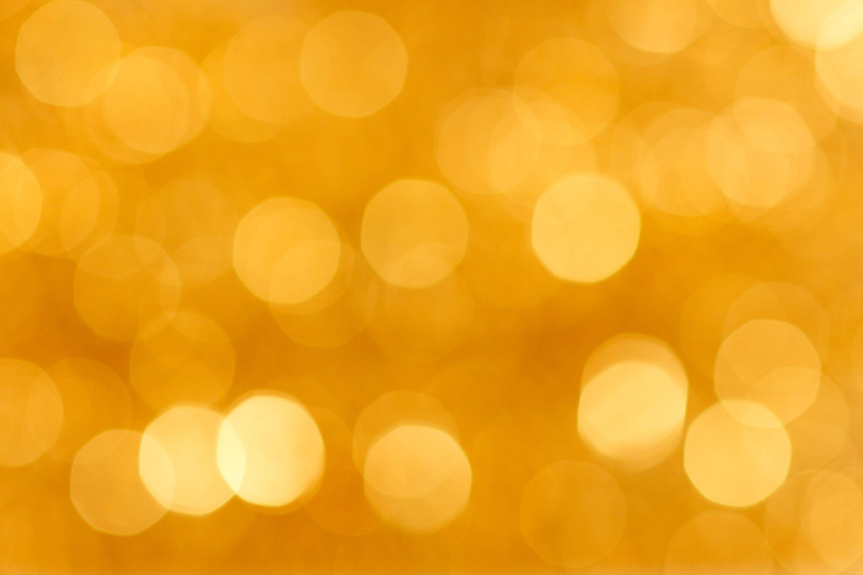 HD Free Blurred Golden Background Wallpaper