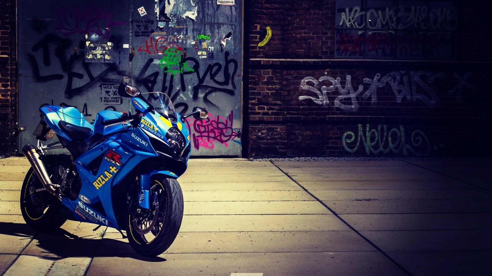 Photography of blue Suzuki GSXR sports bike HD wallpaper. Wallpaper