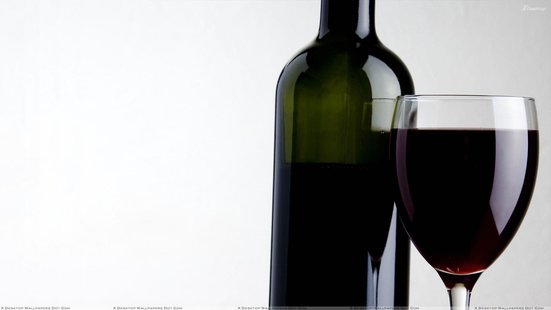 Glass Full Of Wine With Bottle Wallpaper