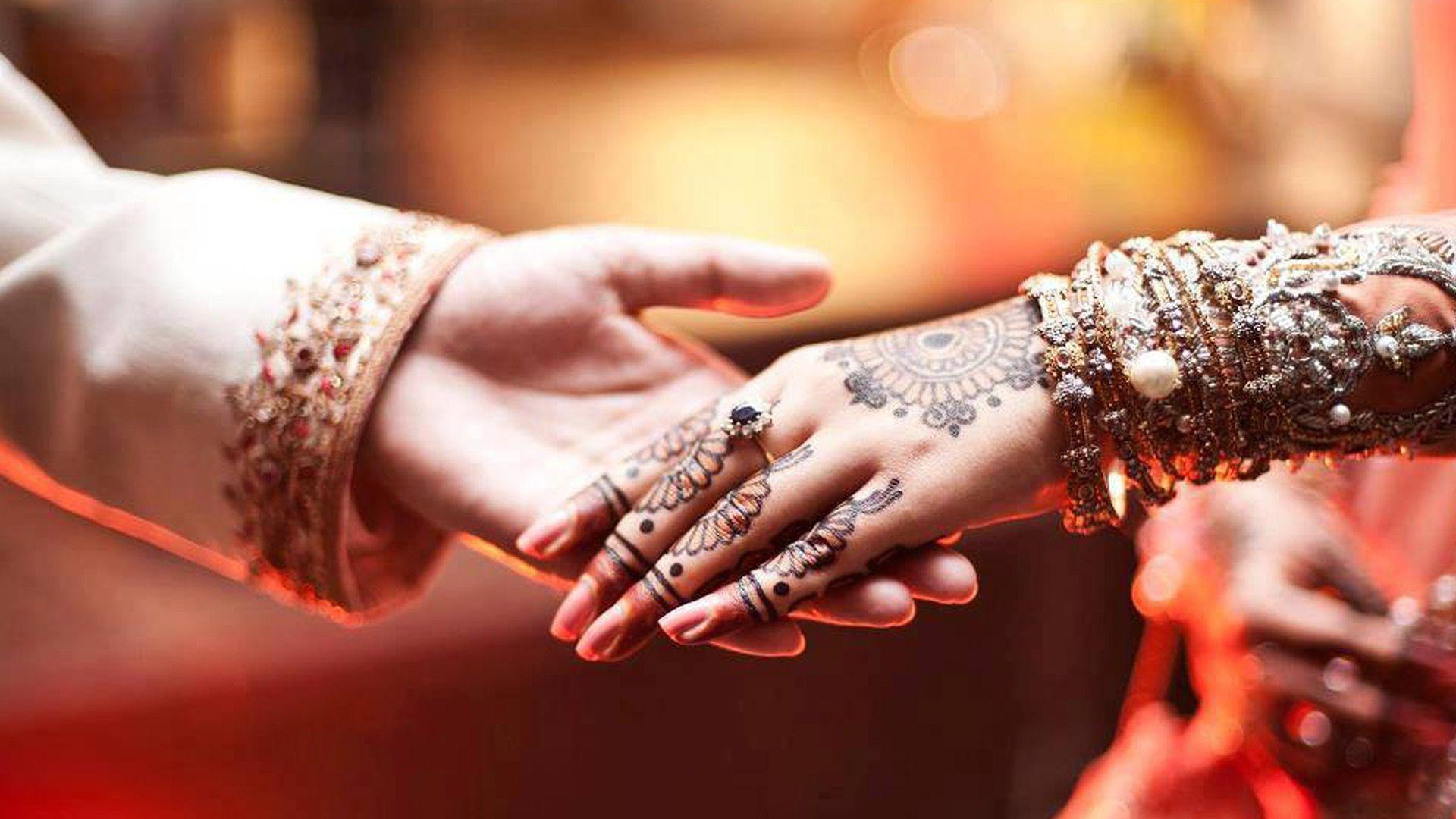 Hands holding couple love wedding wishes. HD Wallpaper Rocks