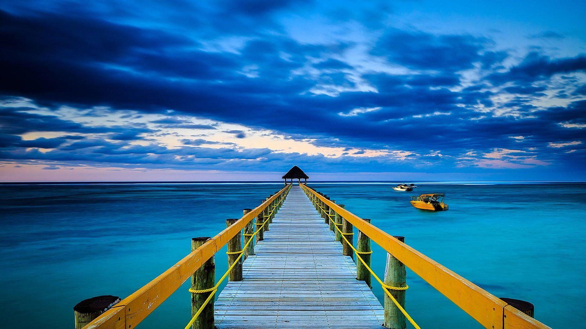 Boat on the blue ocean Wallpaper Wallpaper. art