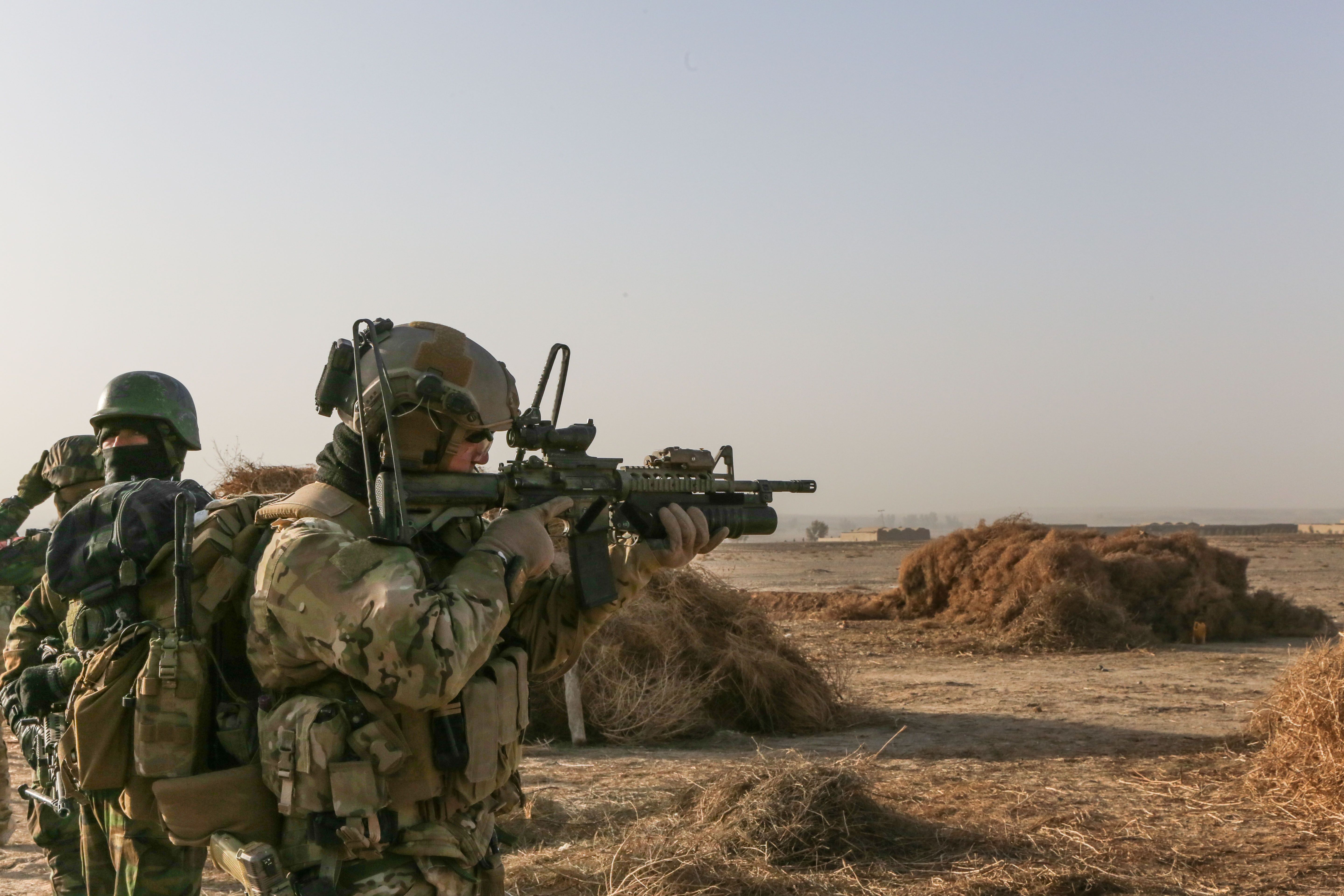 A U.S. Special Forces Soldier With Combined Joint Special Operations Task Force Afghanistan Scans The