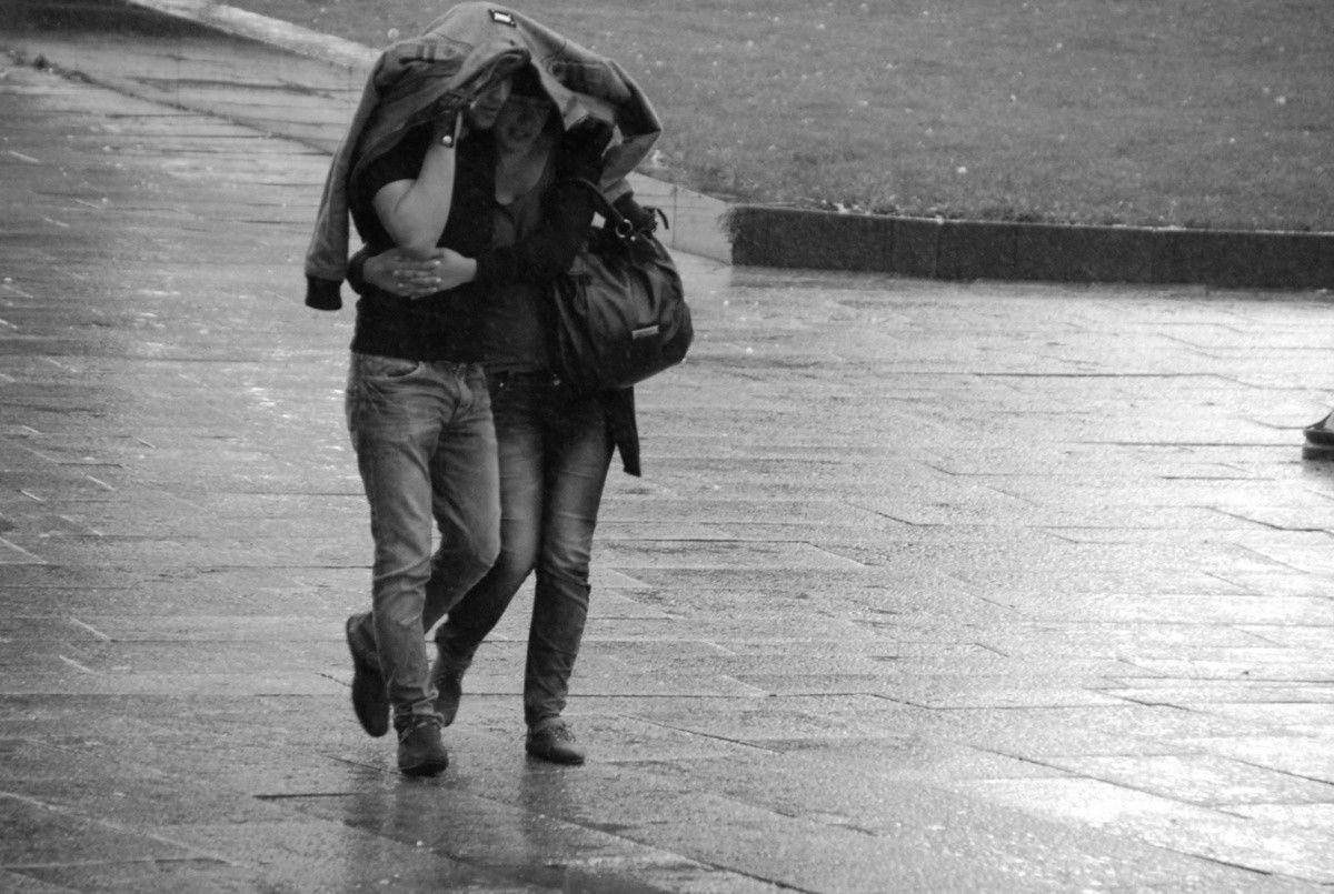 Download Happy monsoon romantic couple in rain wallpaper