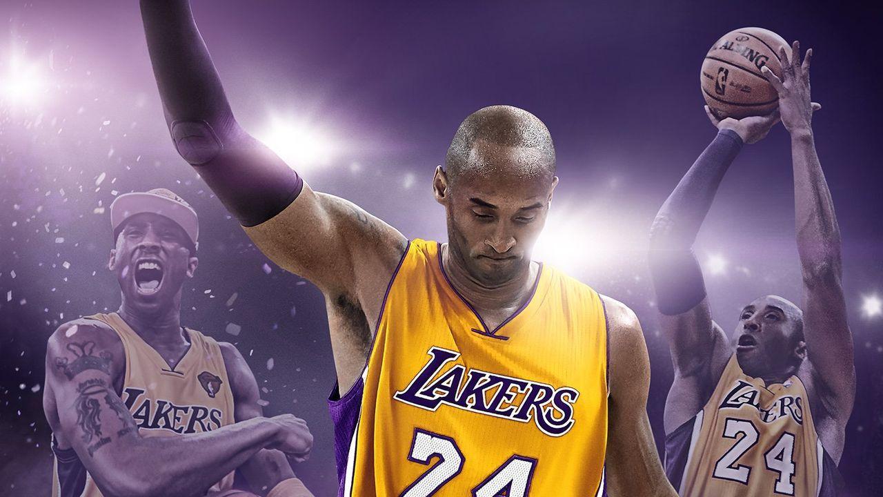 Download Aesthetic Kobe Bryant With Trophy Wallpaper