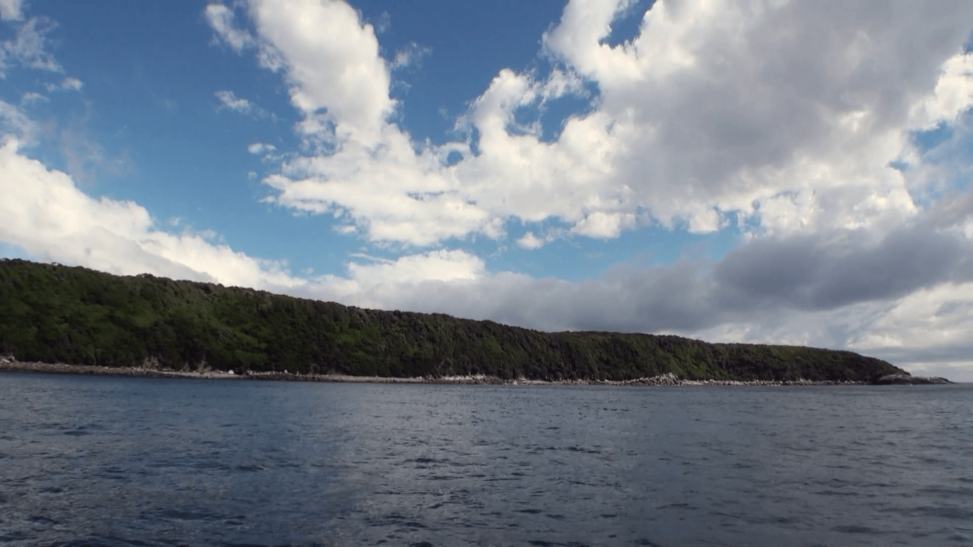 Green mountain panorama view from helicopter window in New Zealand