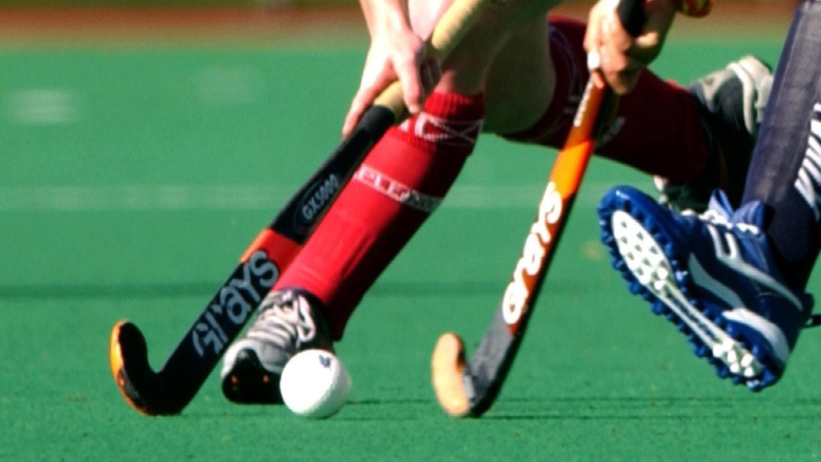 Hockey player in coma after being hit