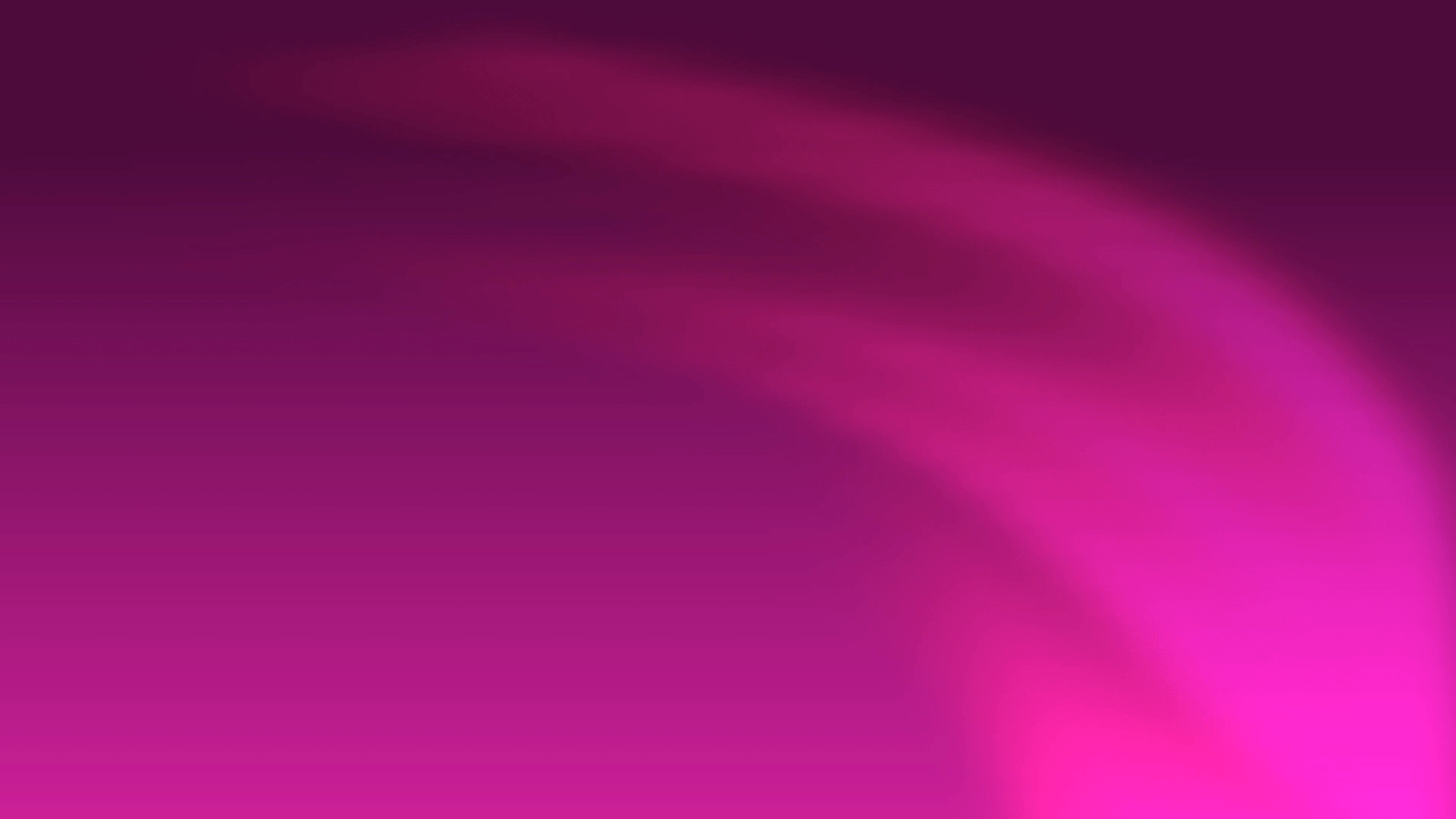 Pink abstract curves of light spread out and fill a dark background