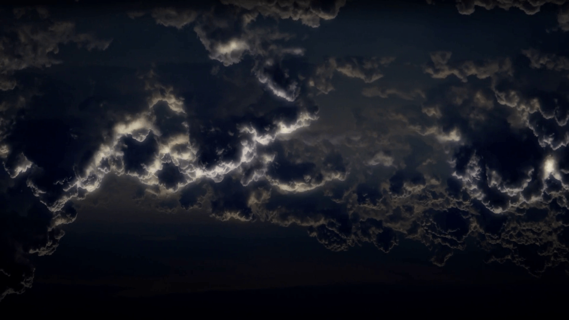 4K Black sky with thunderstorms in the night storm clouds. Powerful