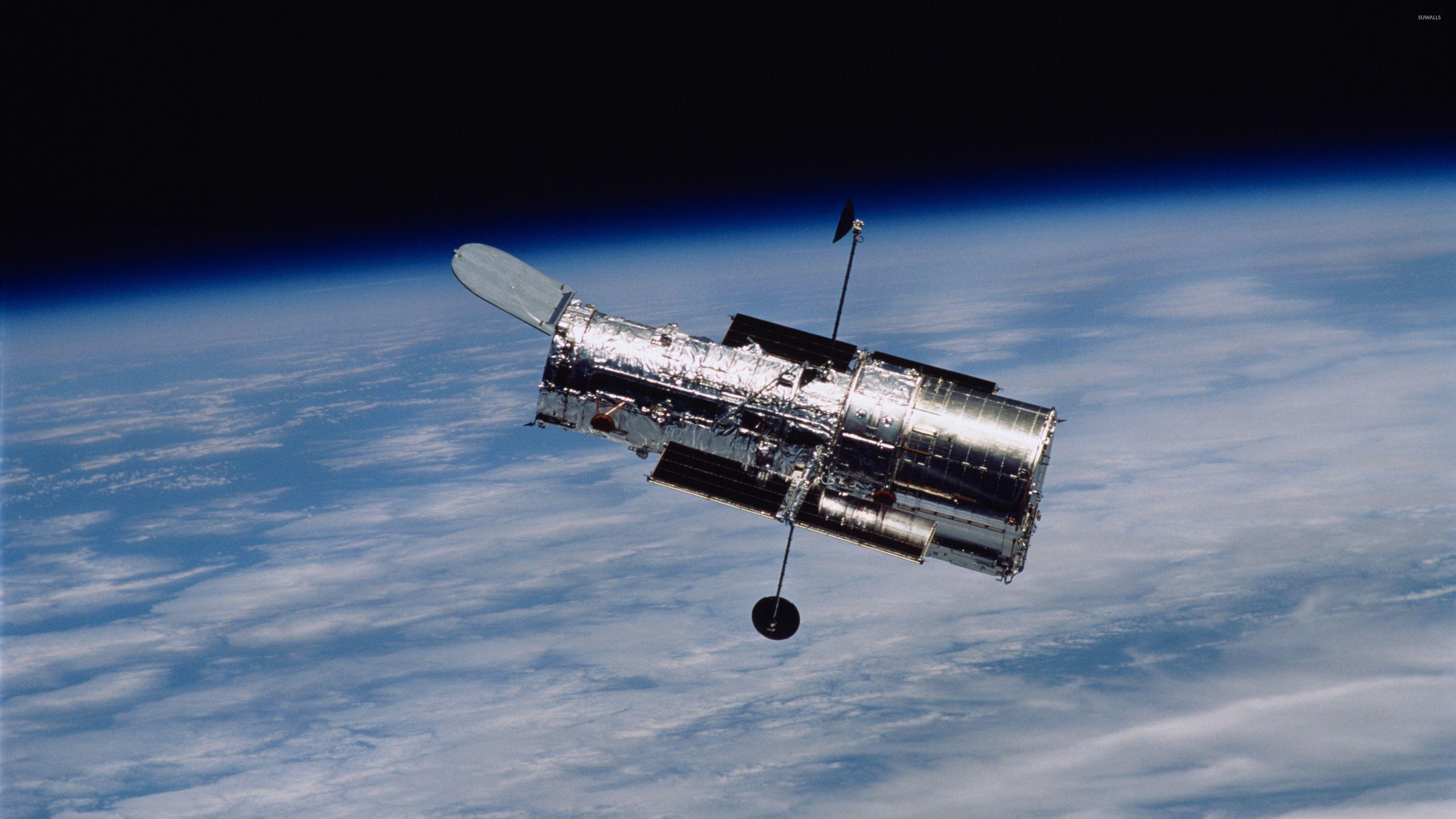 Hubble Space Telescope in orbit wallpaper wallpaper