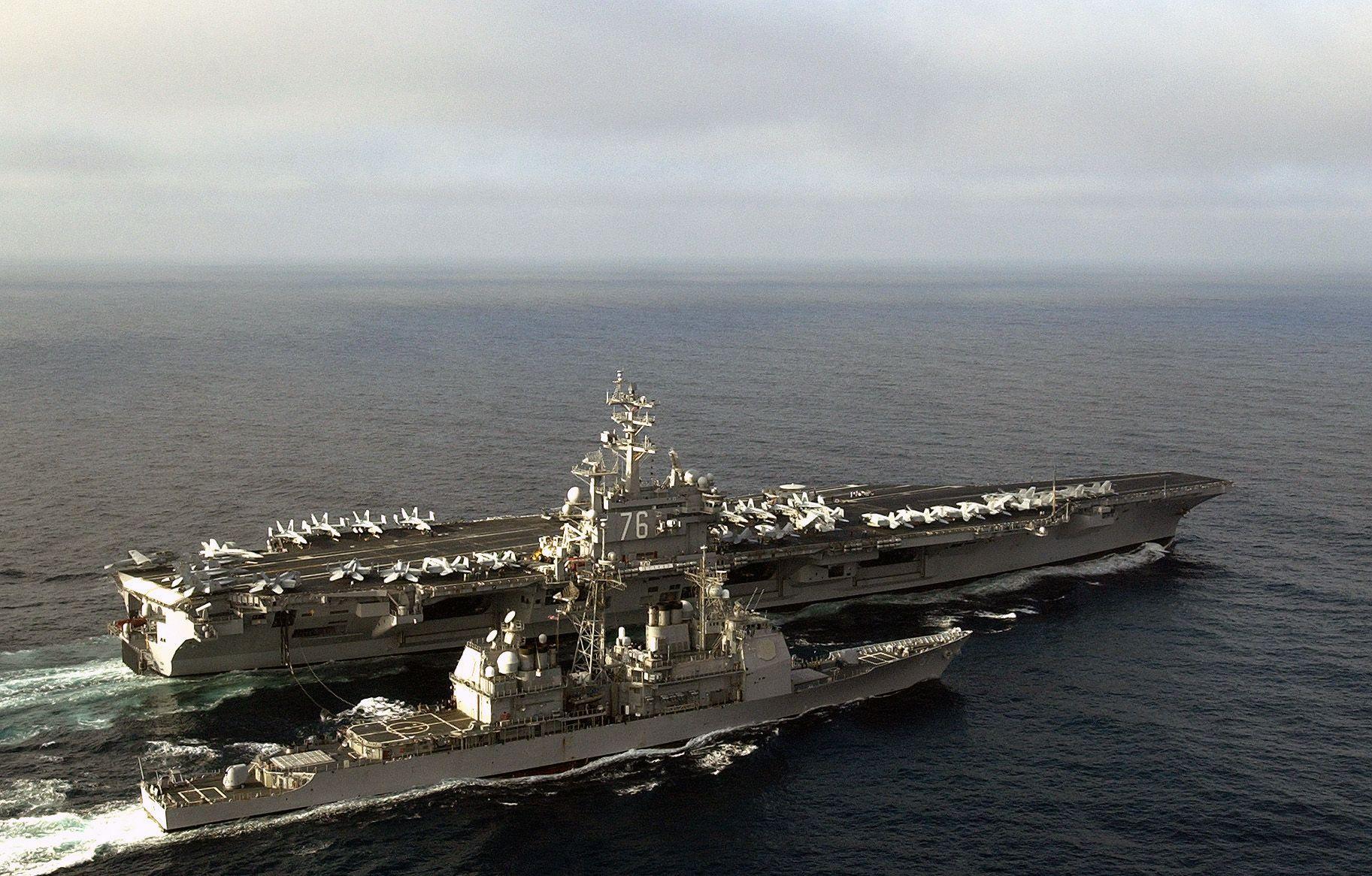 USS Ronald Reagan (CVN 76) And USS Lake Champlain (CG 57). Military