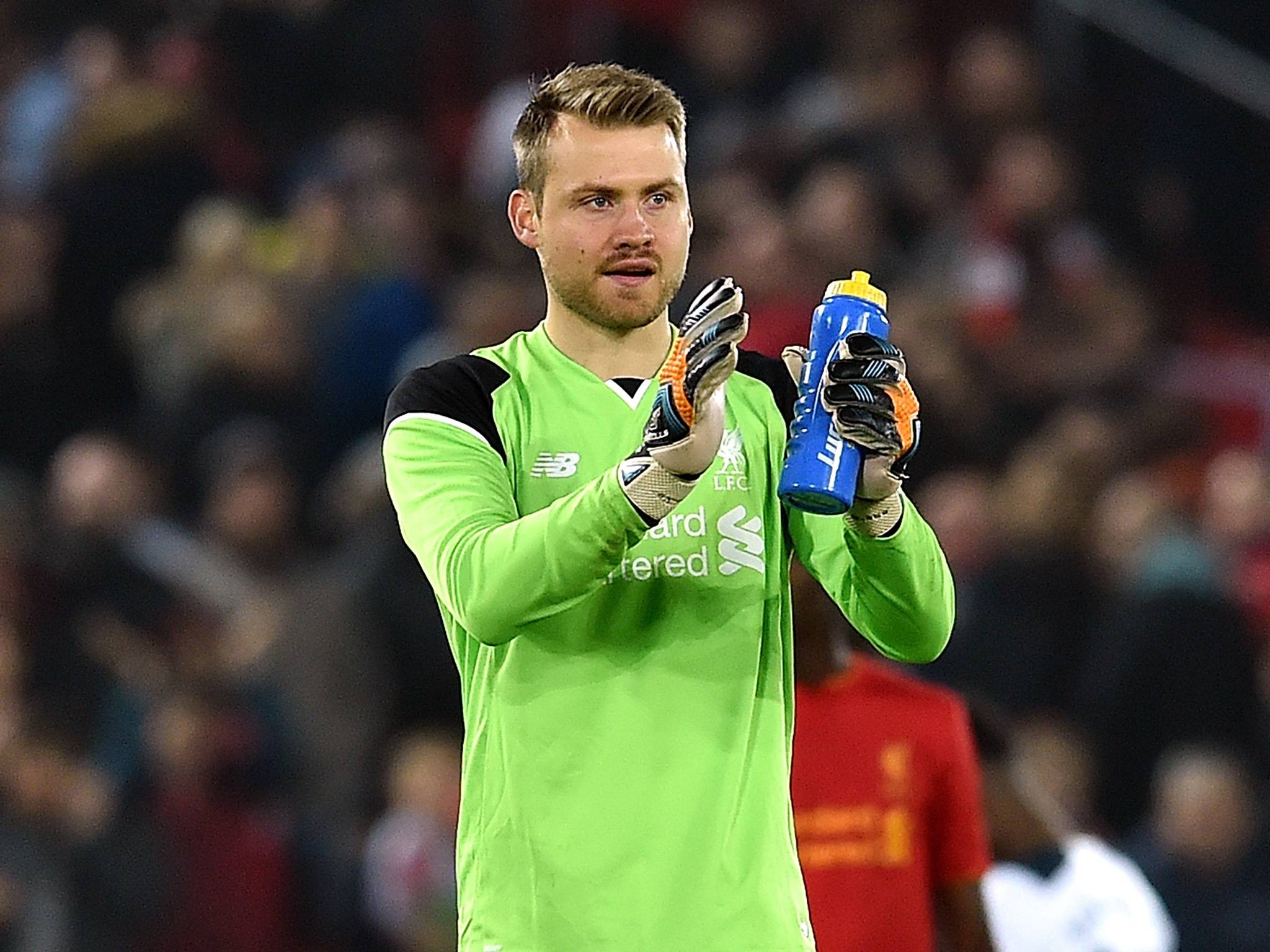 Simon Mignolet still believes Liverpool can catch up Manchester City